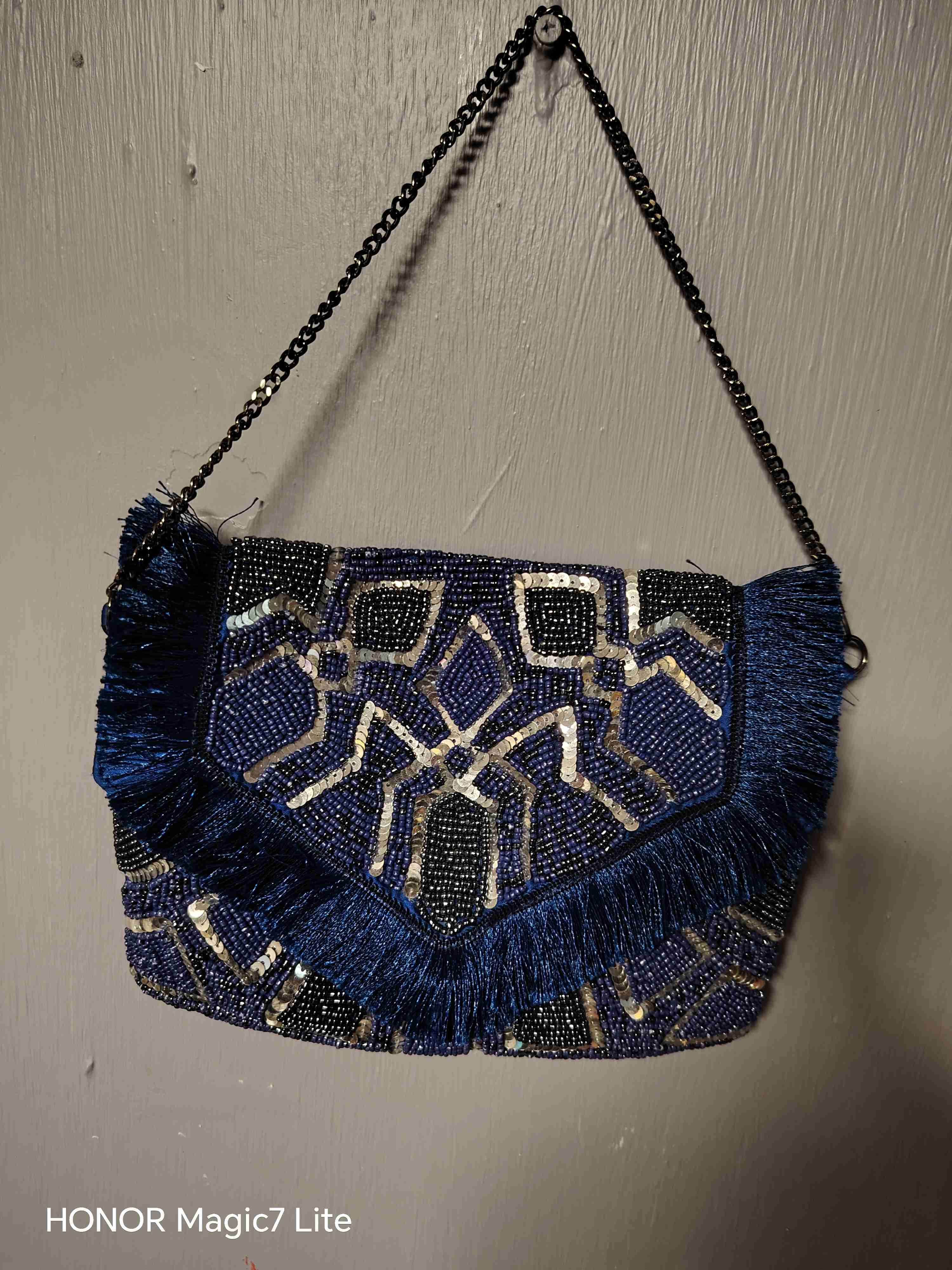 Cartera de mano con lentejuelas