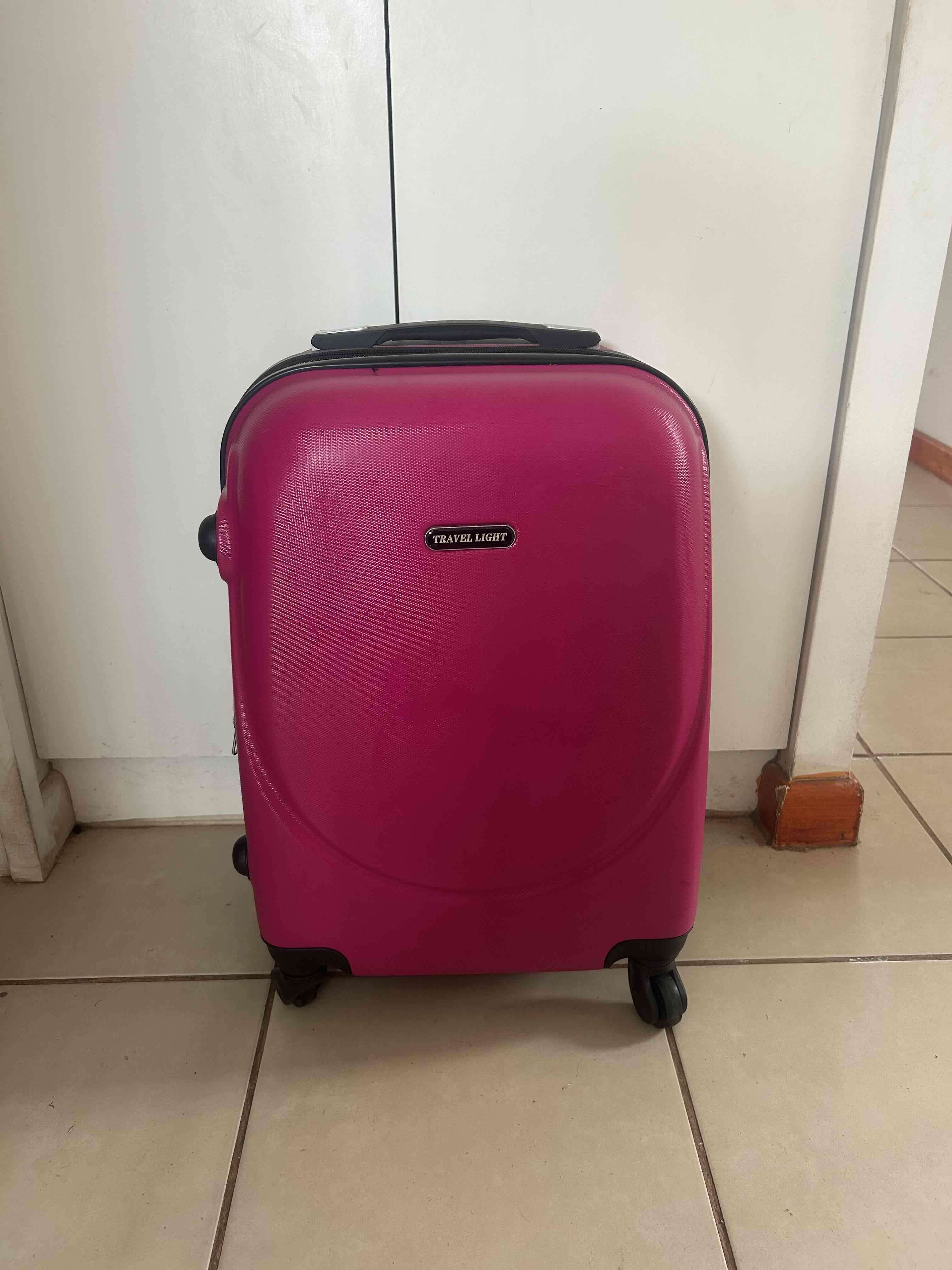 Maleta fucsia con ruedas - miniatura 2