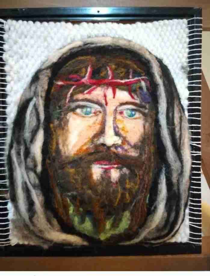 Tapiz con rostro tejido - 2