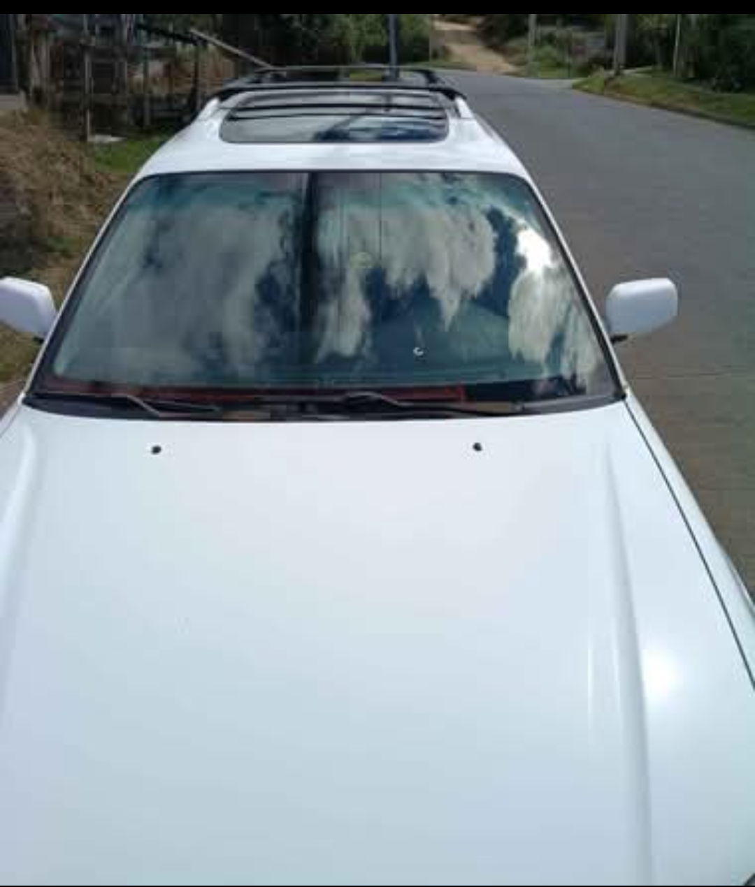 Auto familiar blanco usado - miniatura 2