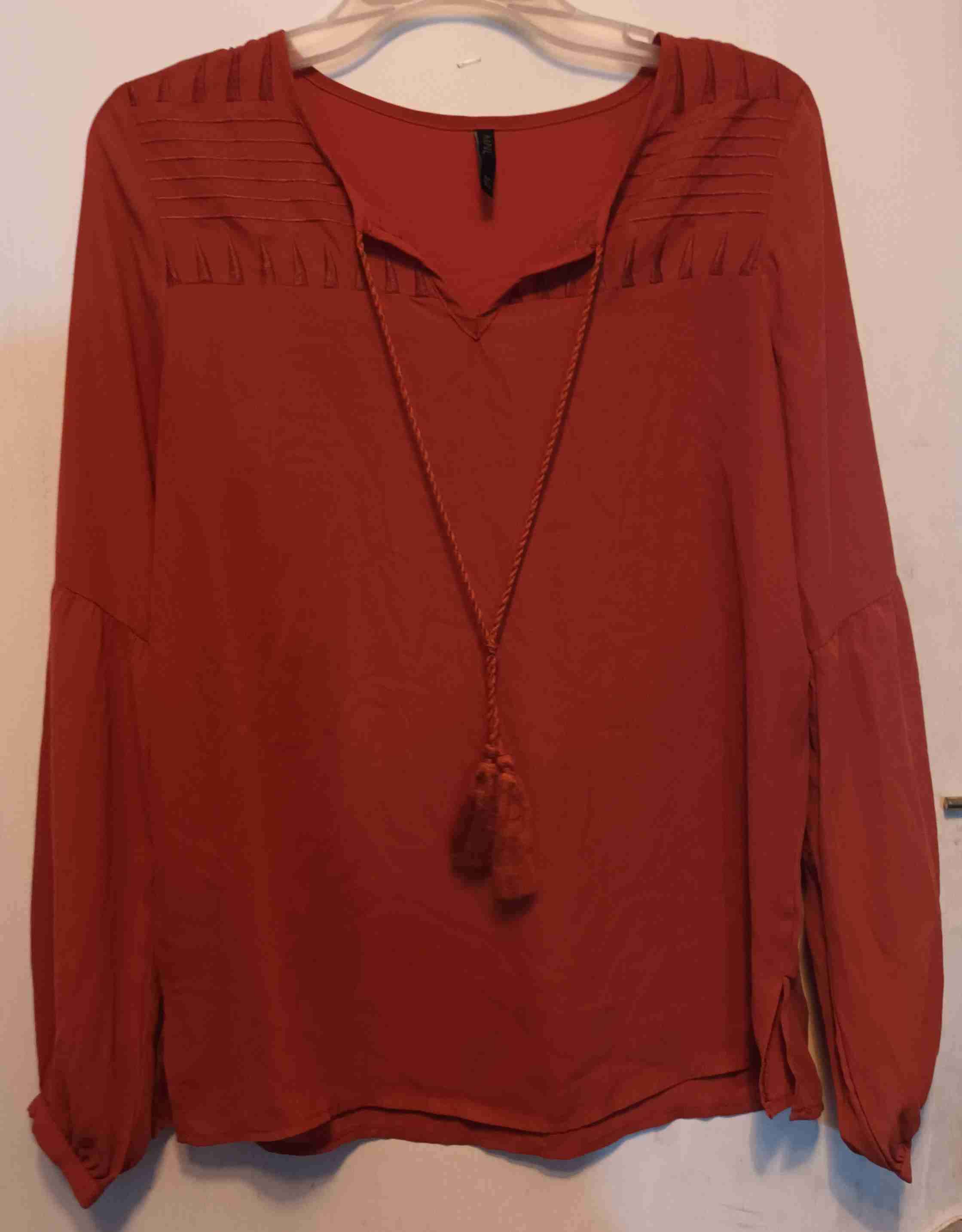 Blusa naranja de manga larga - 1