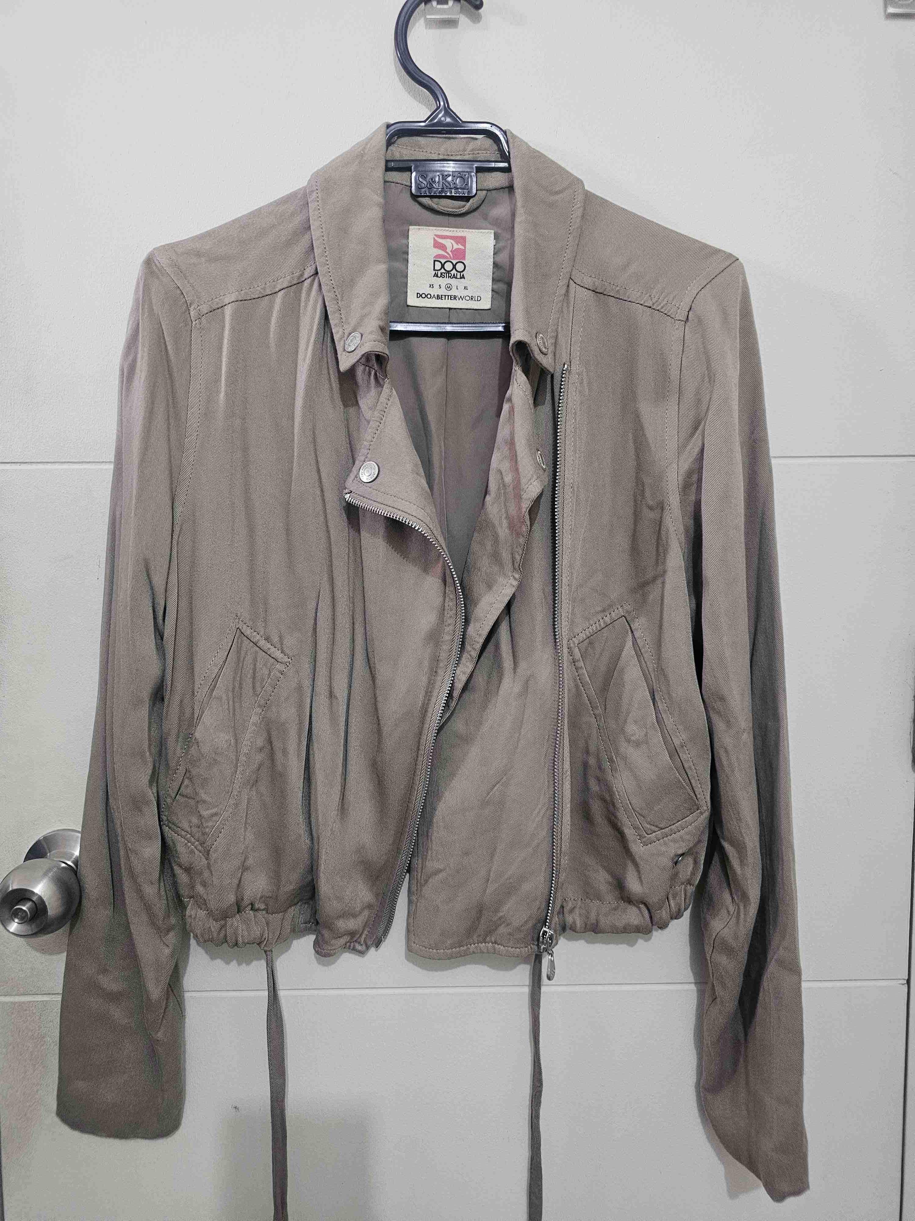 Chaqueta beige con cierre - miniatura 1