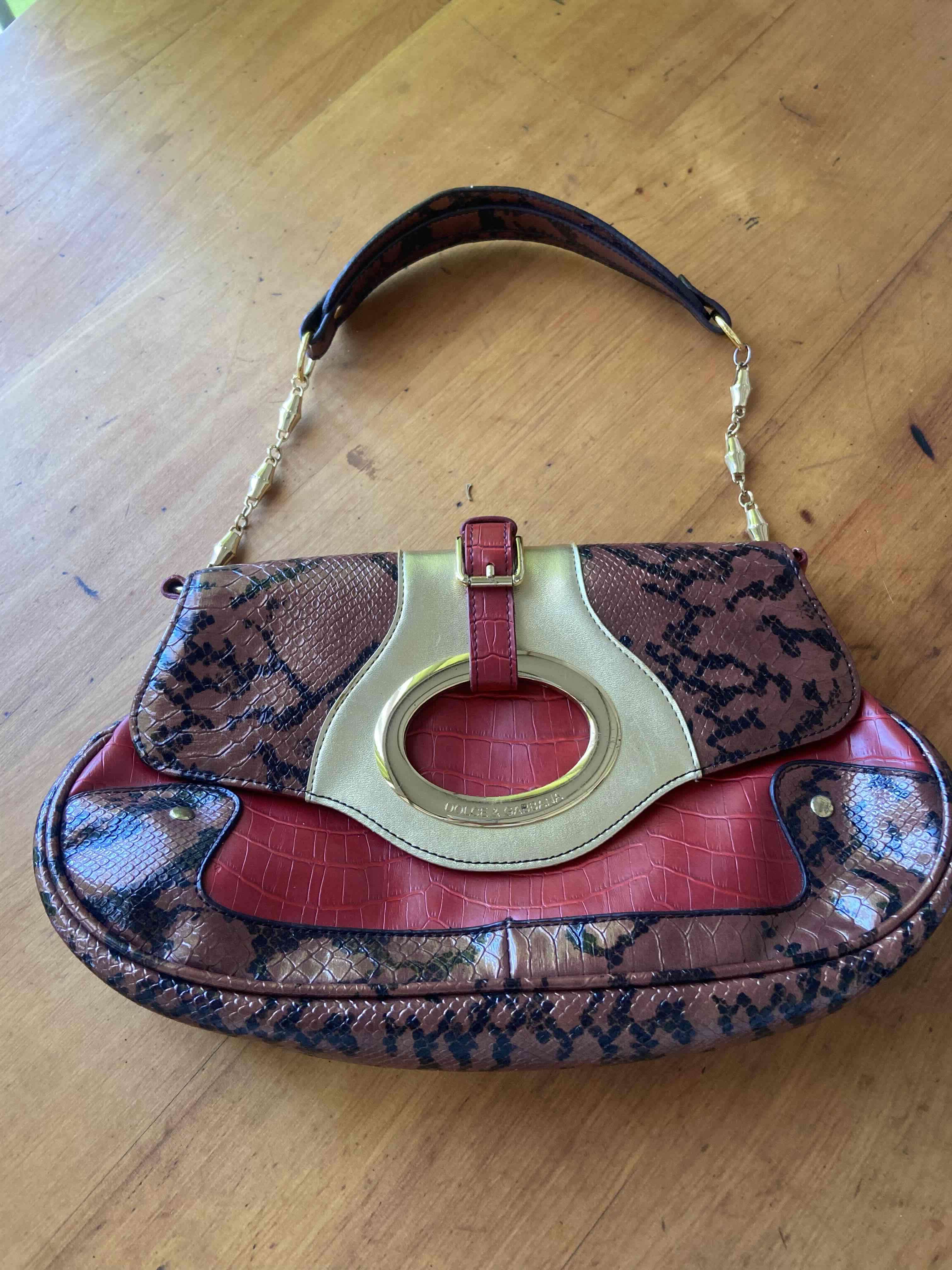 Cartera de mano exclusiva con diseño de pitón - miniatura 1