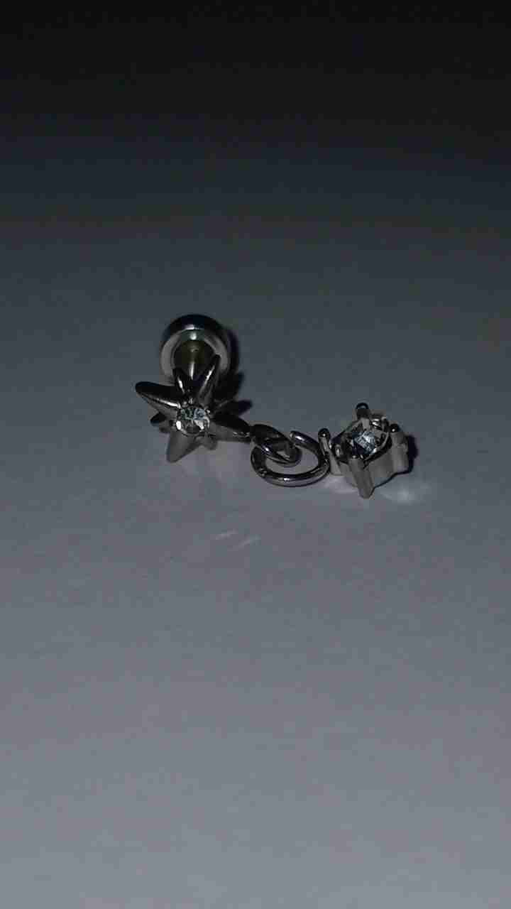 Piercing de estrella con brillantes