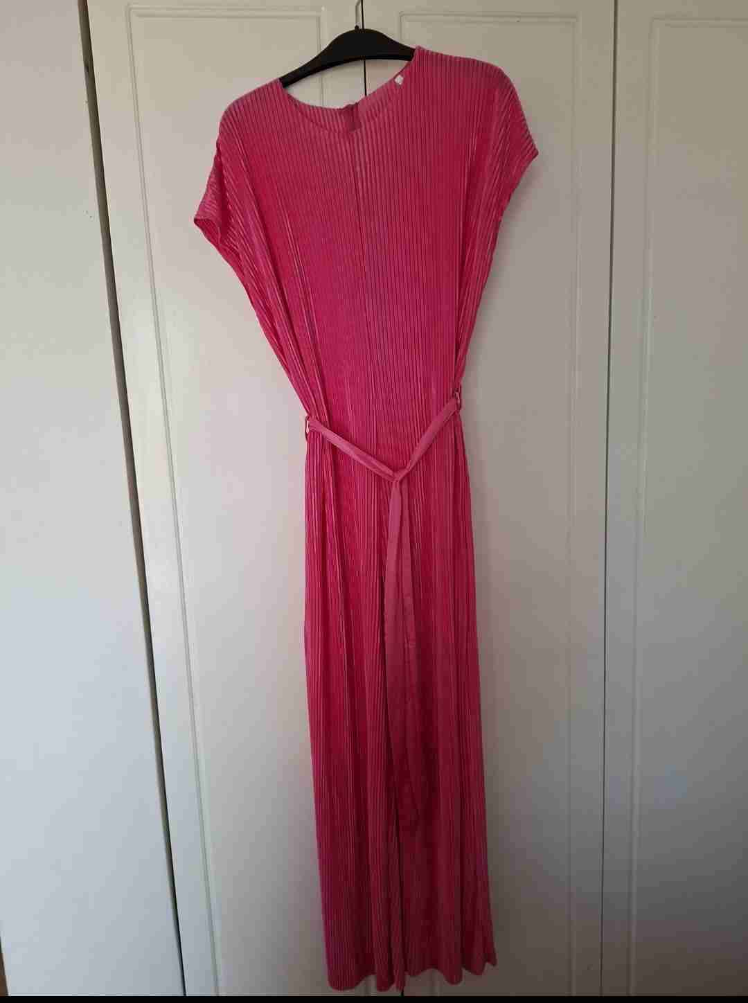 Enterito plisado fucsia