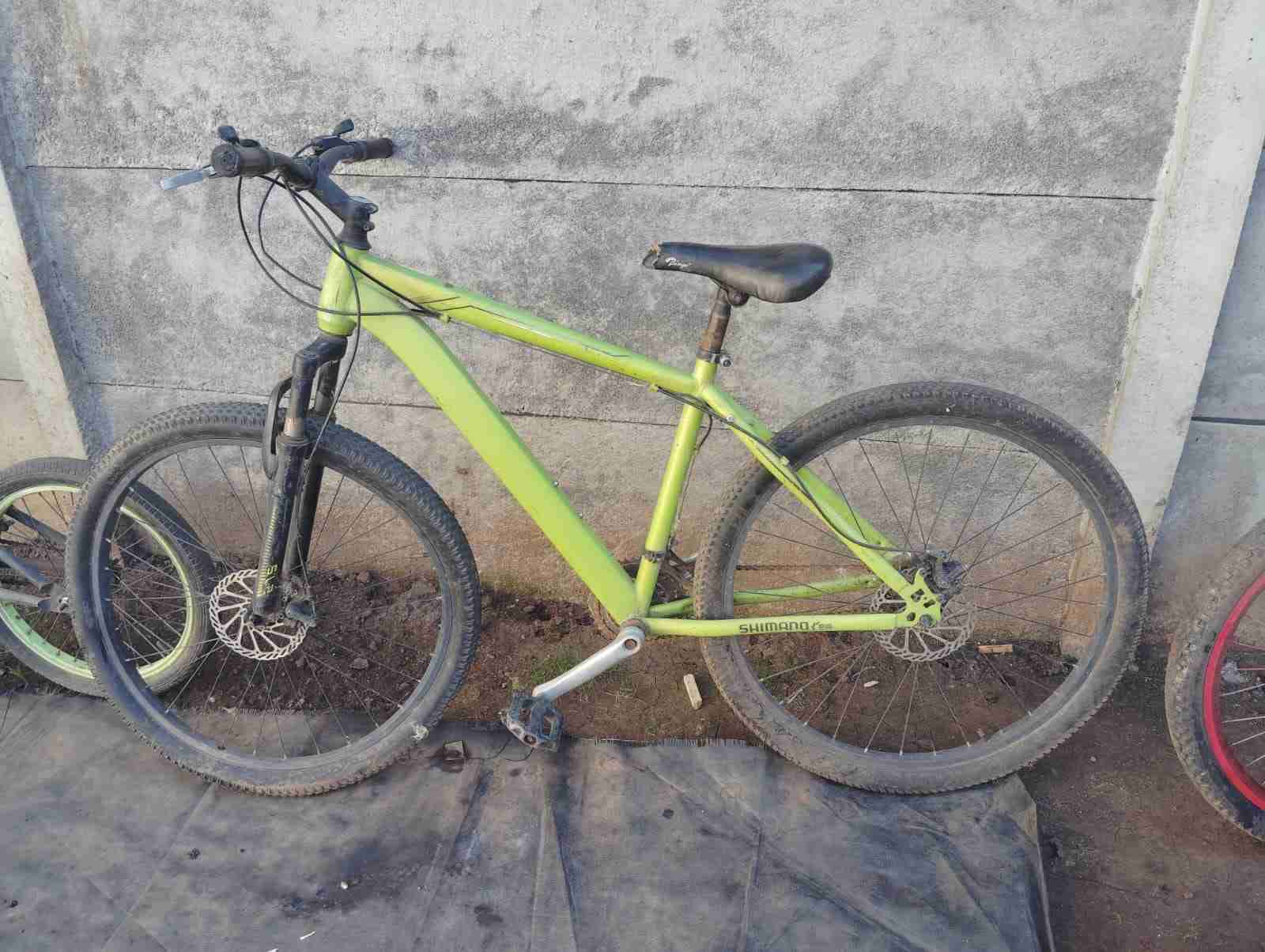 Bicicleta montaña verde Shimano - miniatura 1