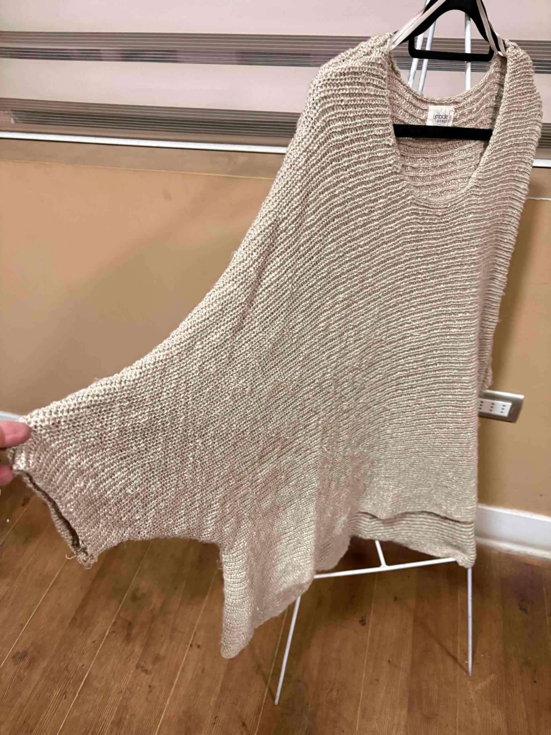 Poncho tejido beige - miniatura 1