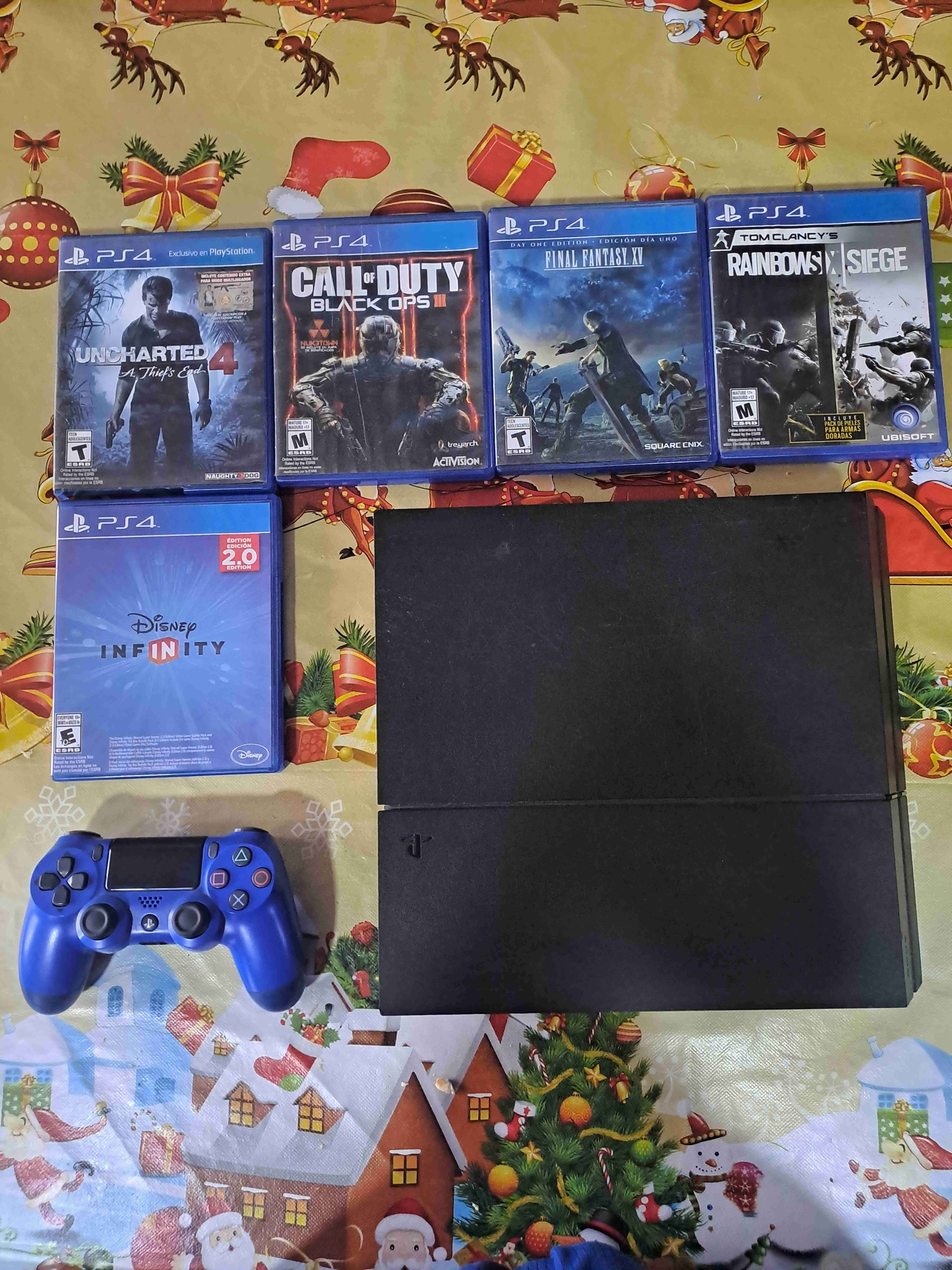Consola PS4 con juegos(precio conversable)