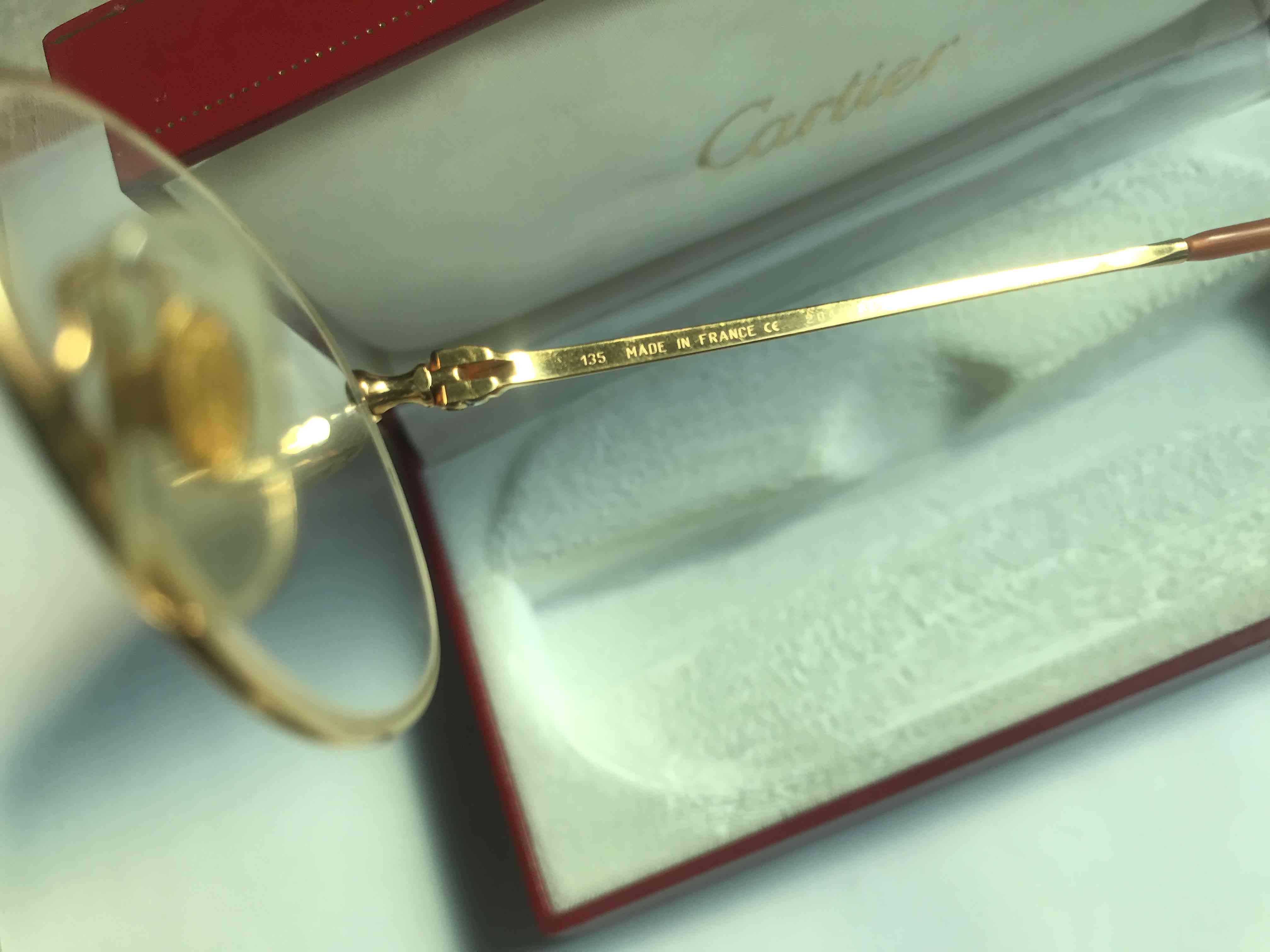 Lentes Cartier dorados en estuche - miniatura 2