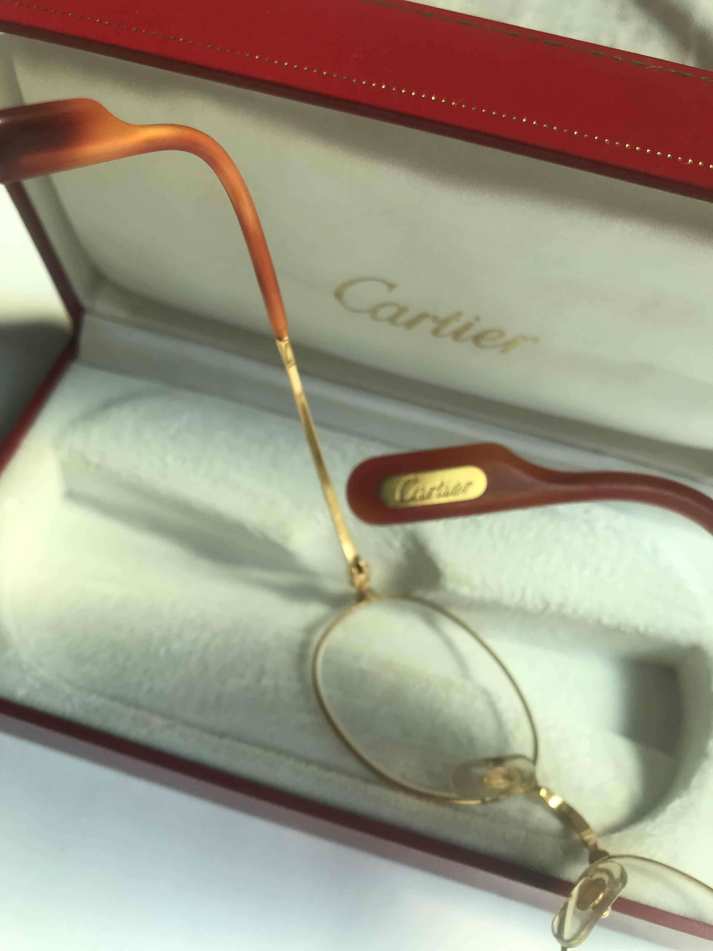 Lentes Cartier dorados en estuche - miniatura 3
