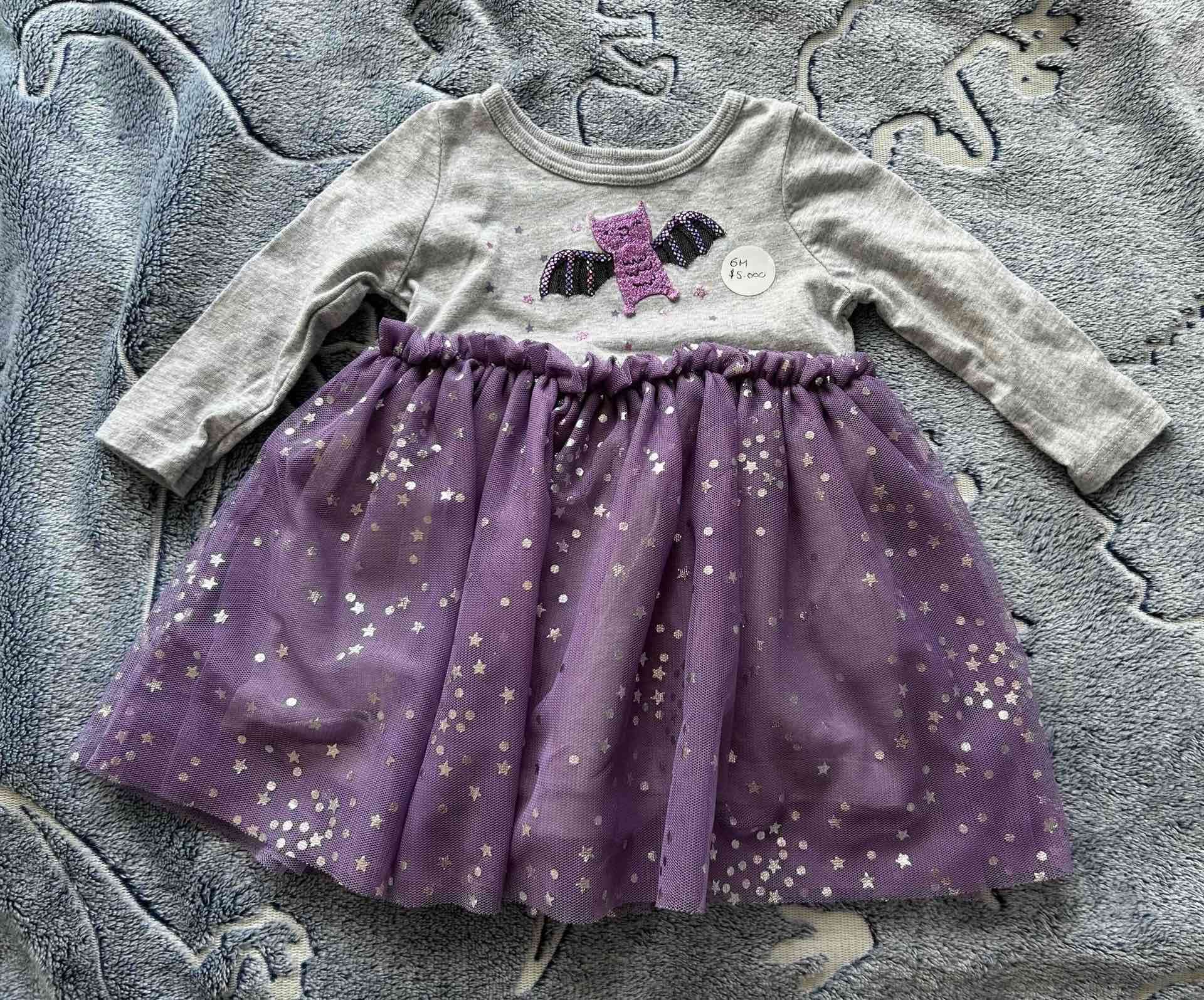 Vestido niña murciélago púrpura
