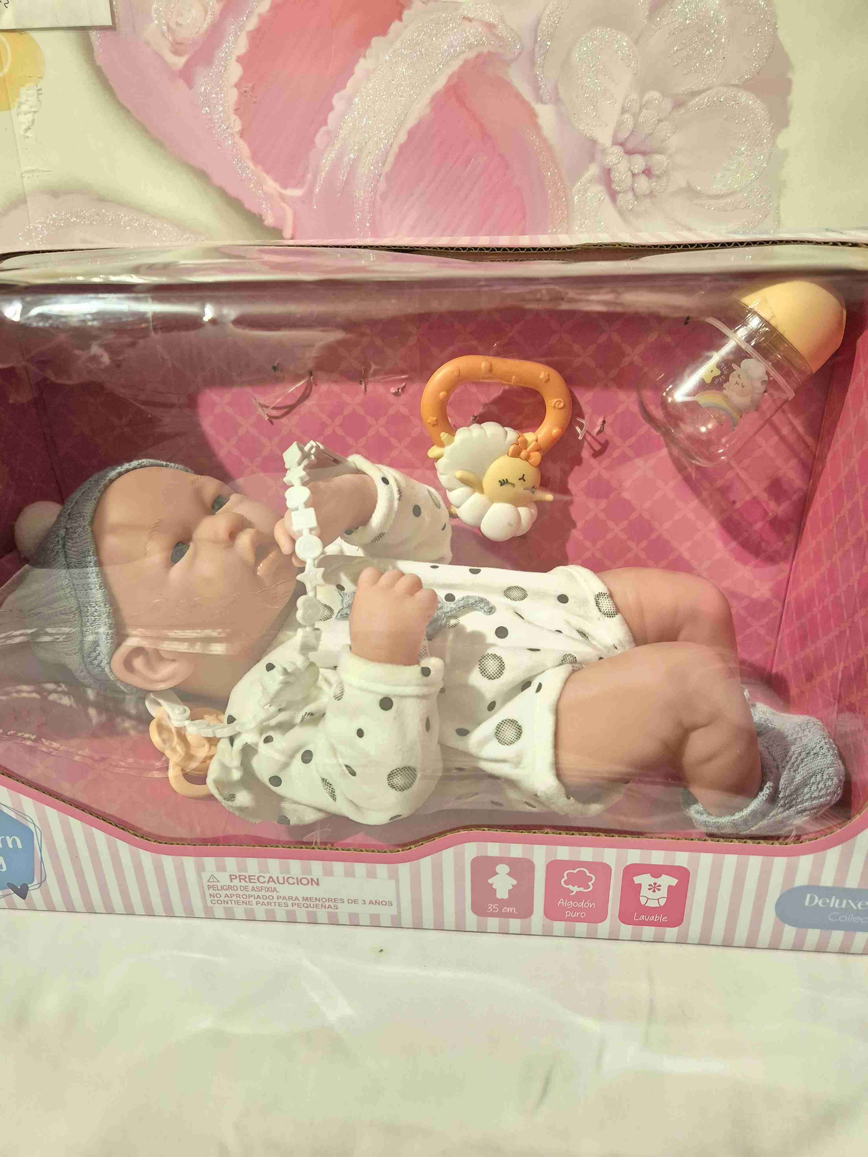 Muñeca bebé con accesorios - miniatura 1