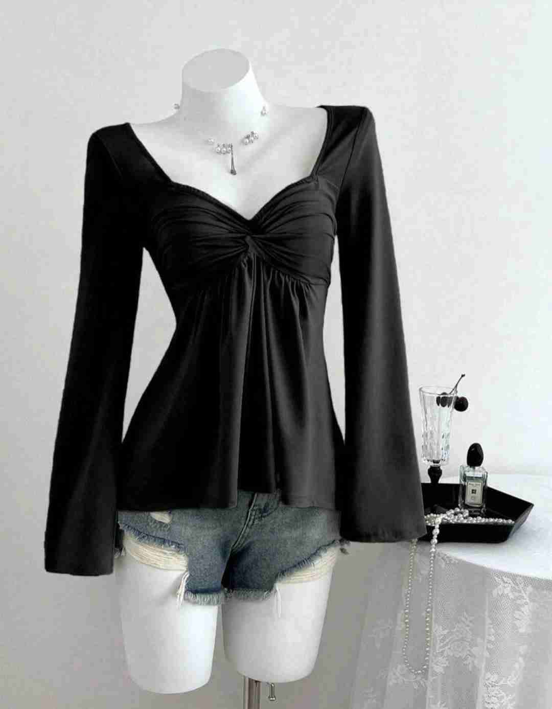 Blusa negra manga larga - miniatura 1