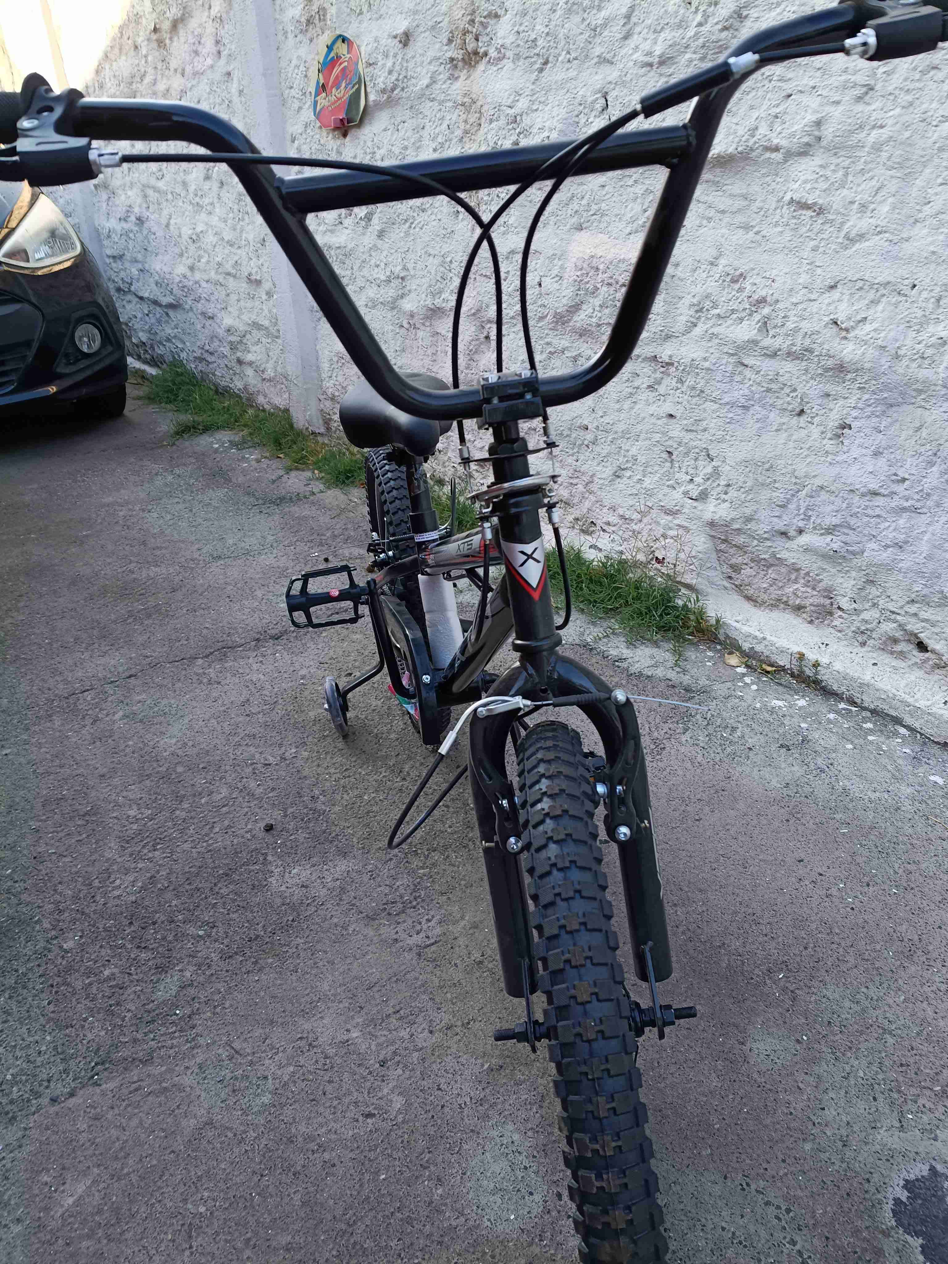 Bicicleta infantil negra con ruedas - 5