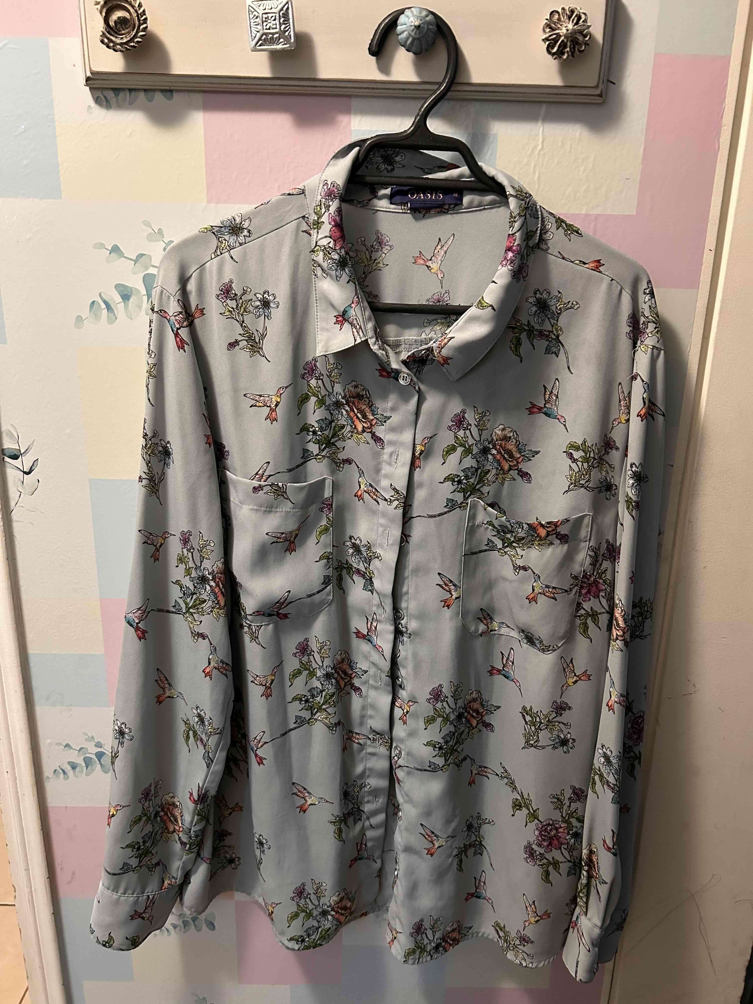 Blusa colibrí Marca OASIS