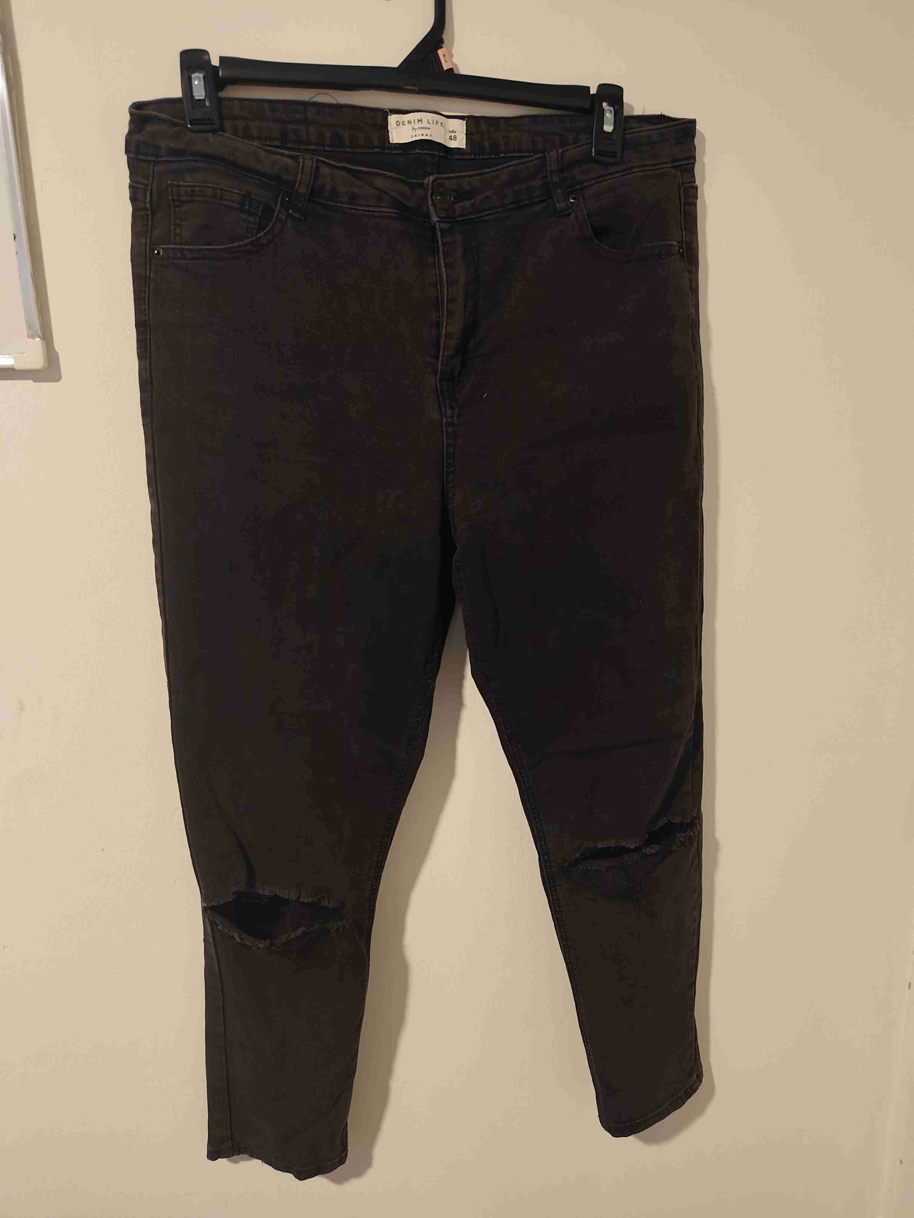 Jeans negros con roturas - miniatura 1