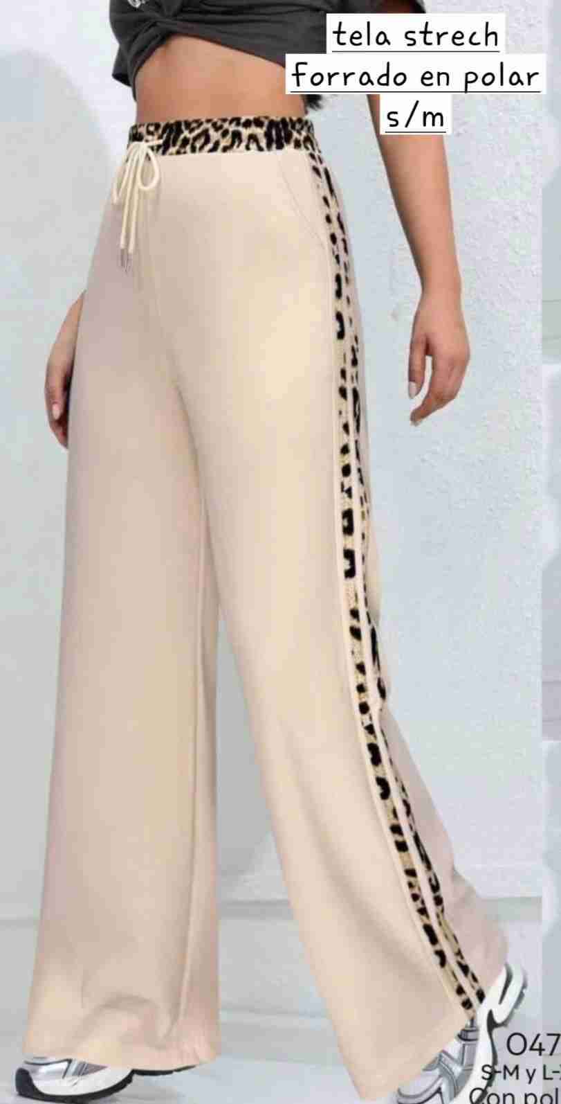Pantalones beige con diseño print