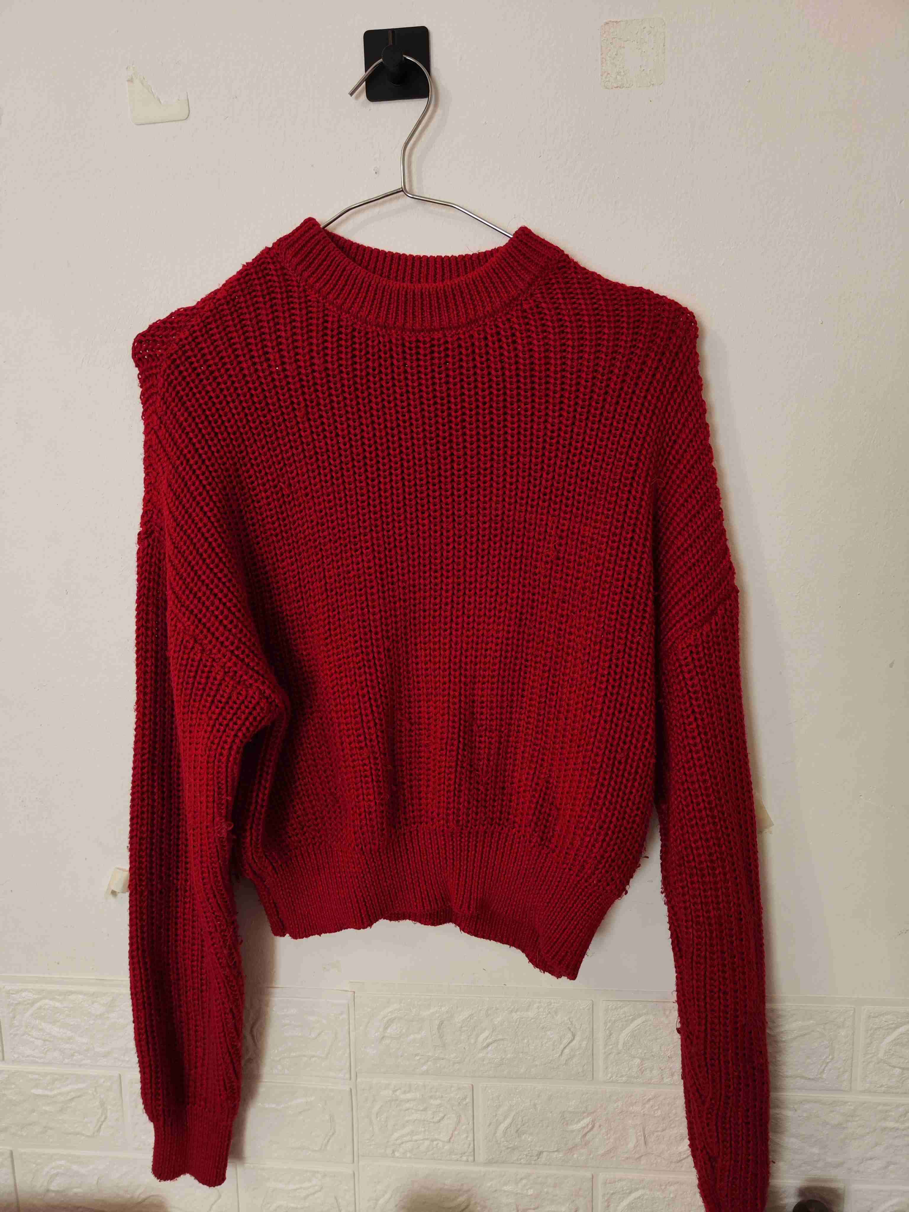 Suéter rojo de punto grueso