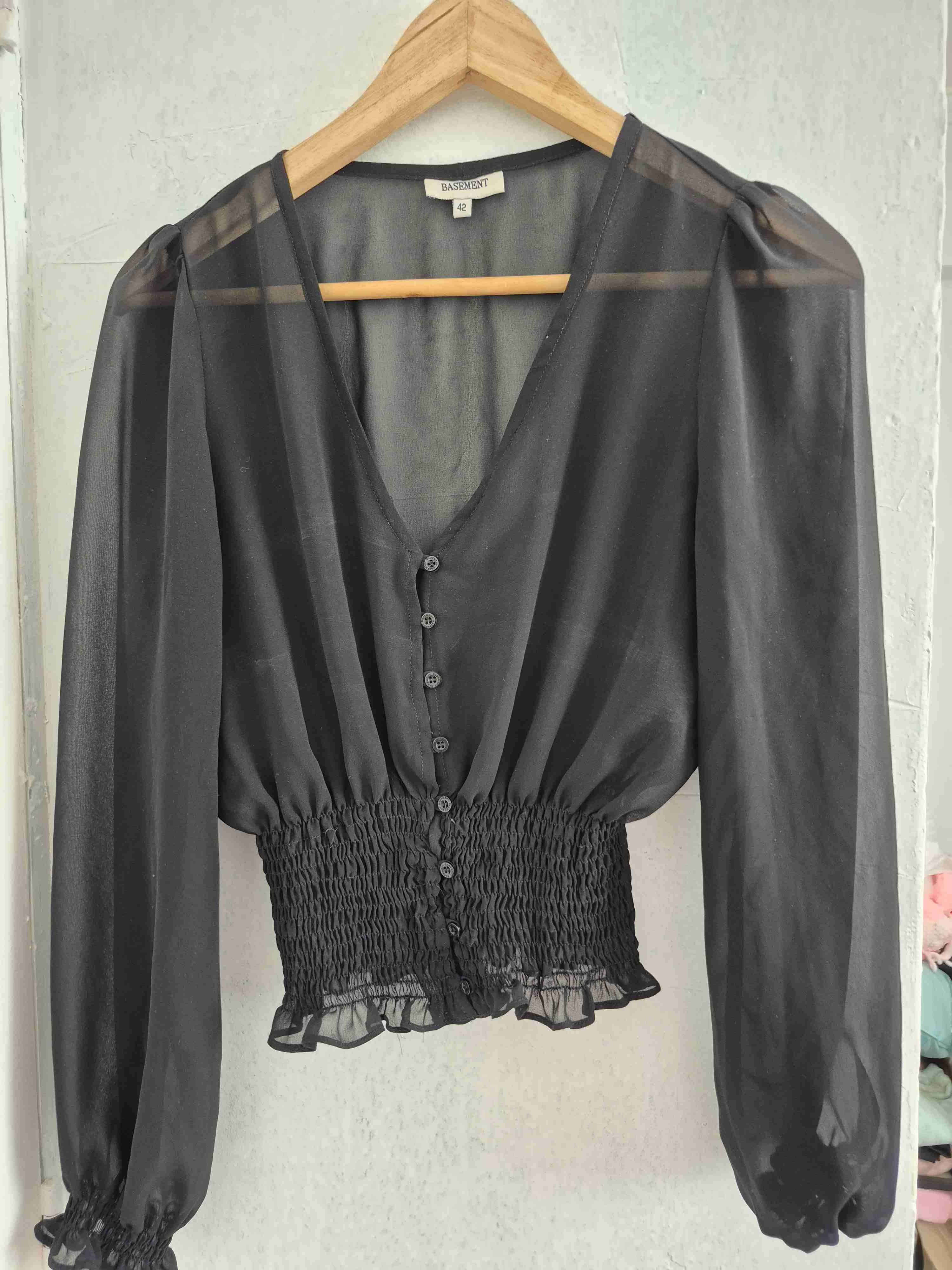 Blusa negra transparente