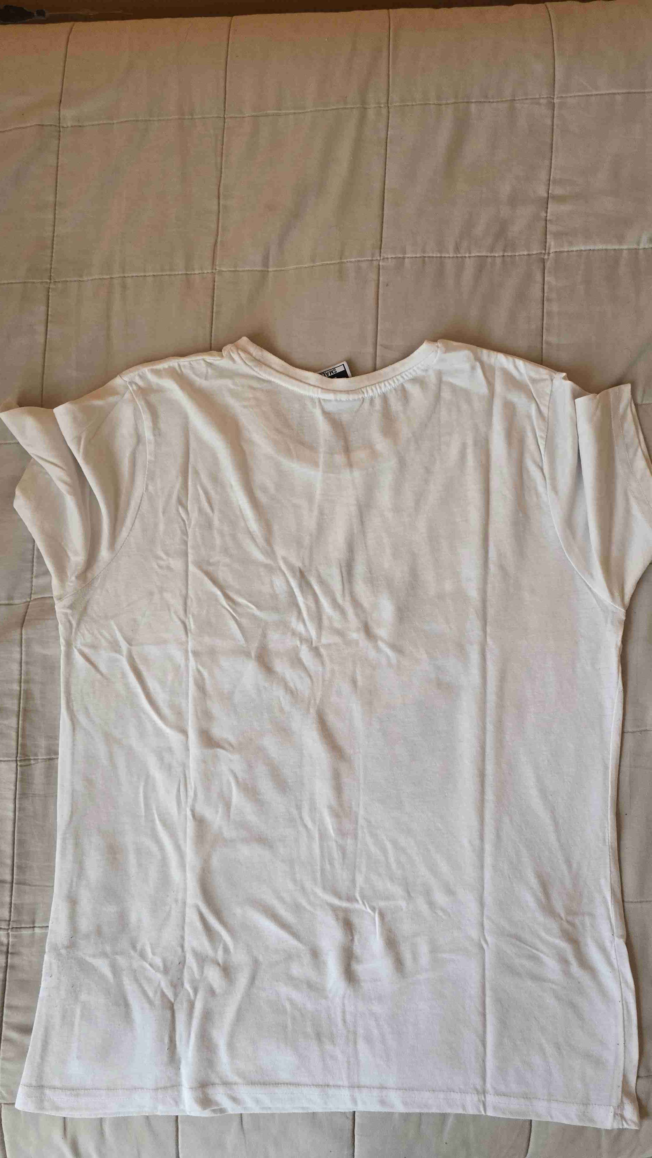 Polera blanca con audífonos - miniatura 3