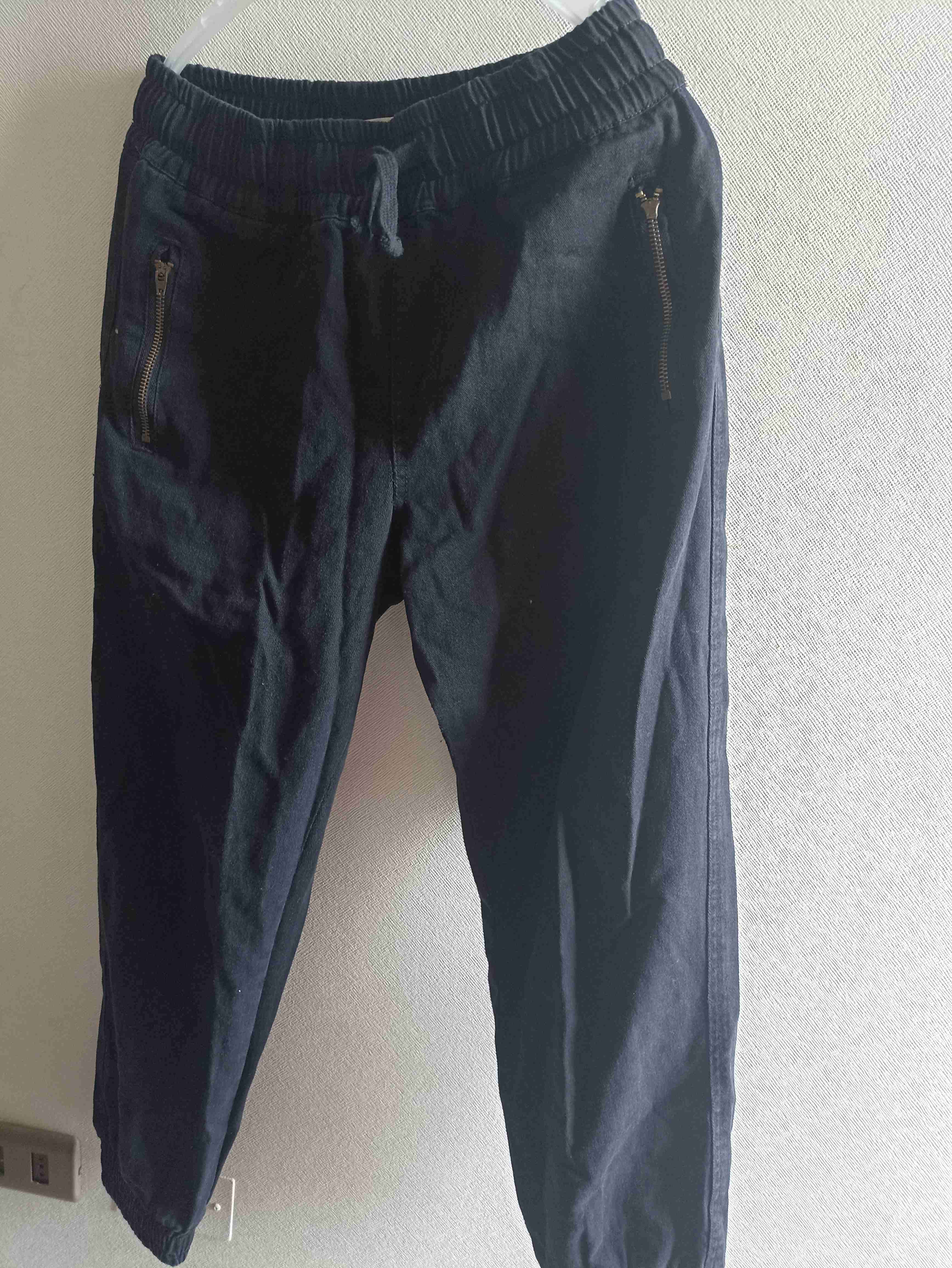 Pantalones negros con cierre - 1