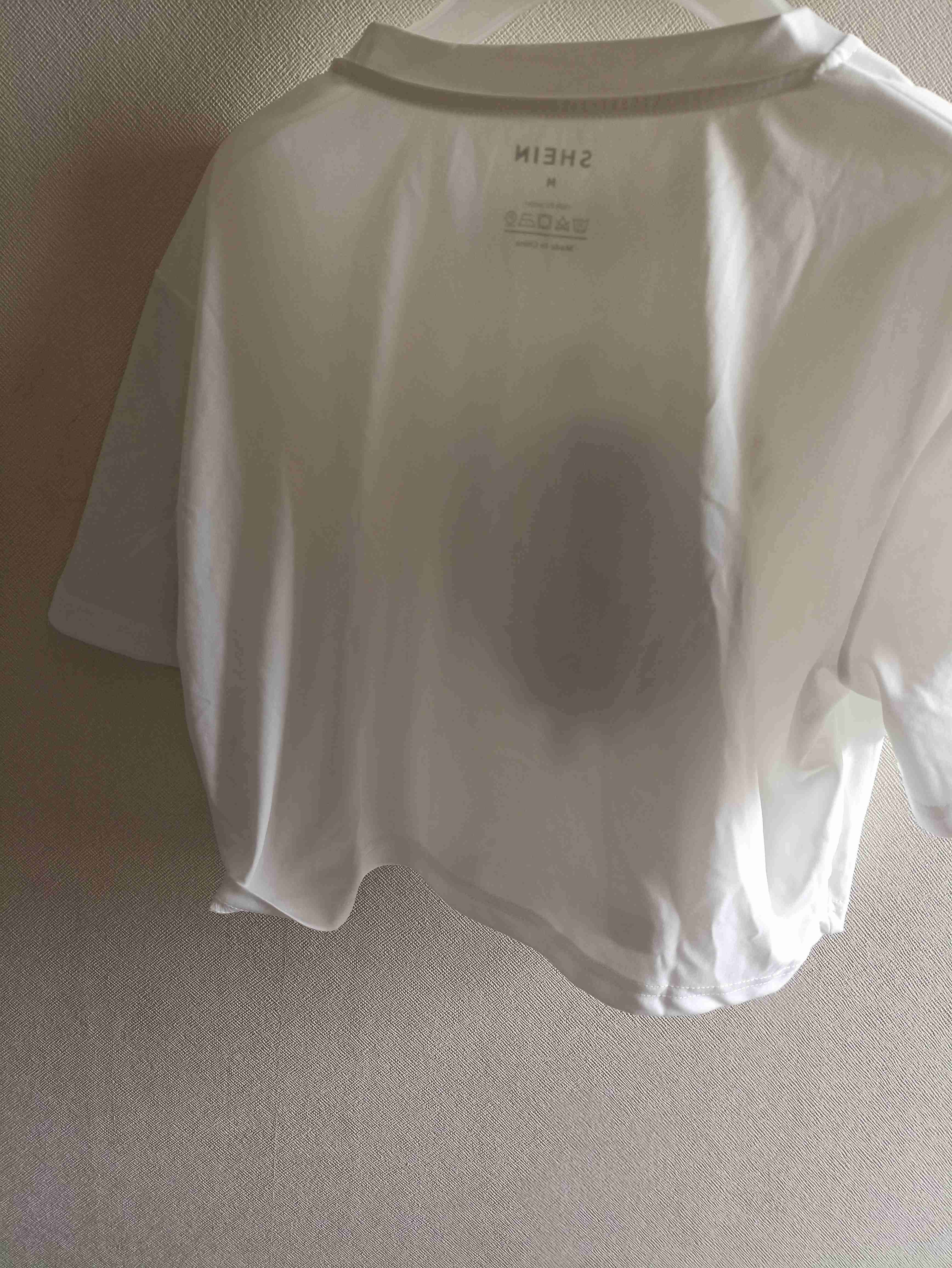 Polera blanca con diseño sonriente - miniatura 3