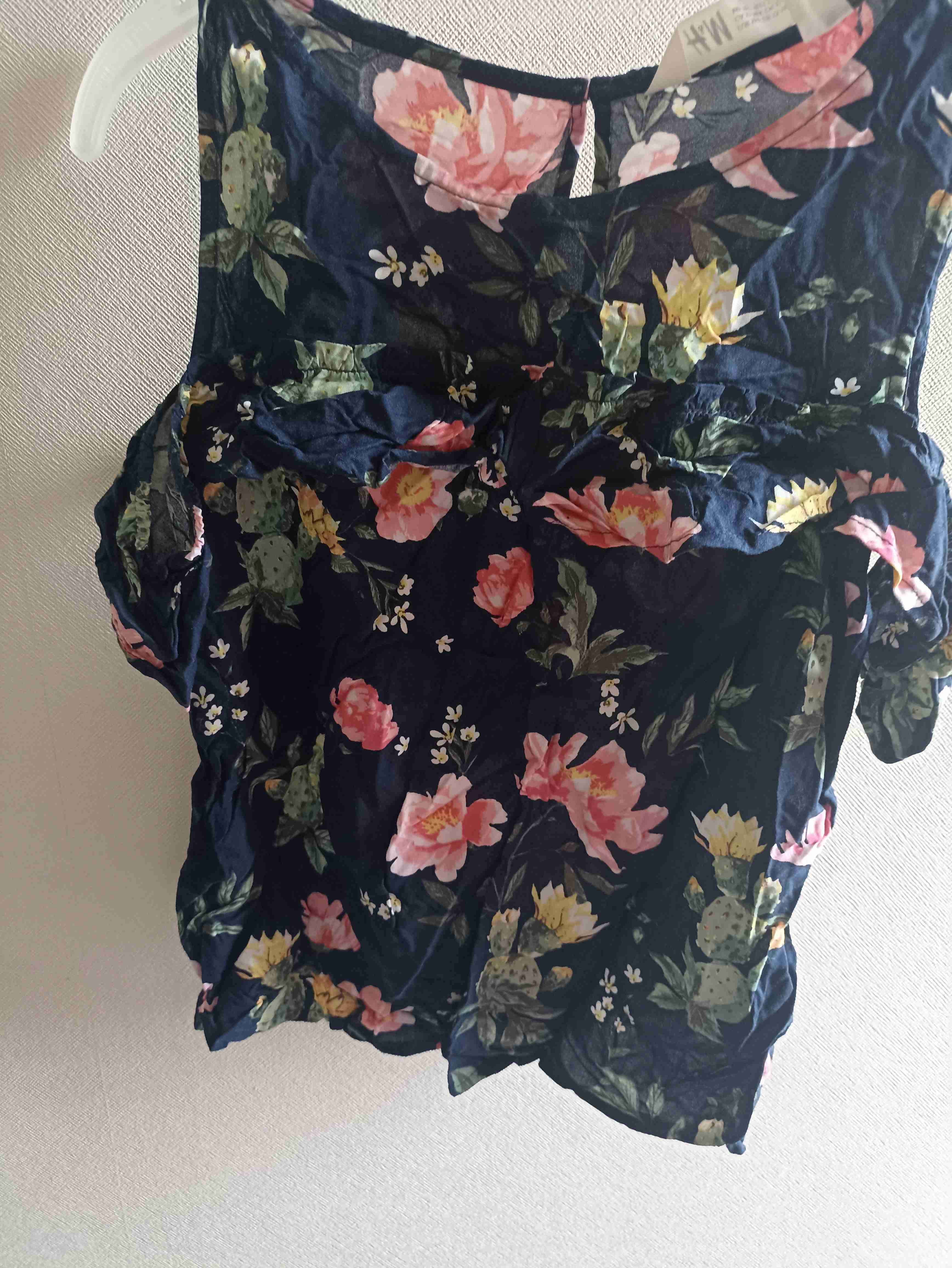 Blusa sin mangas floreada - 1