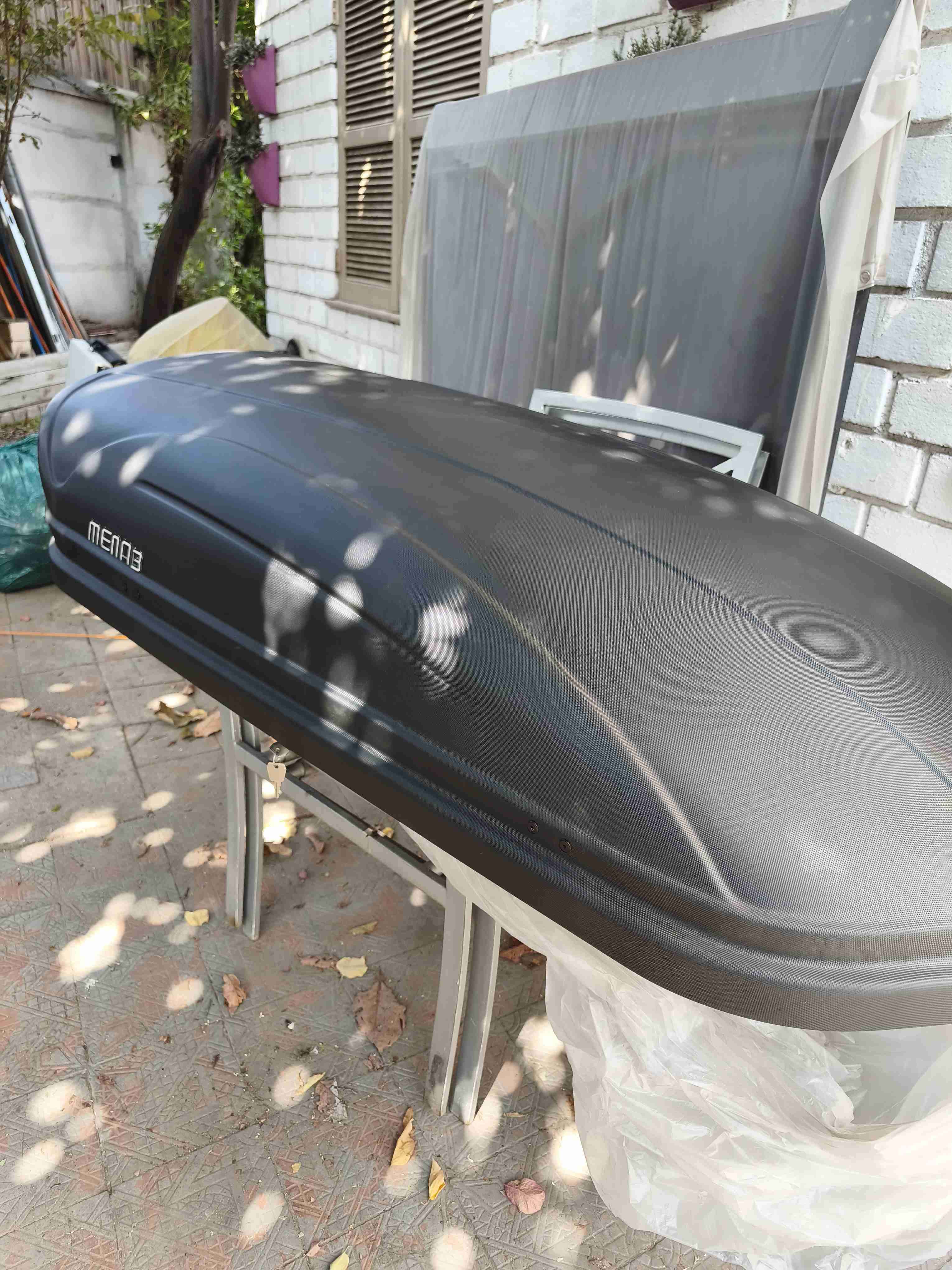 Baúl portaequipaje de techo negro - miniatura 1