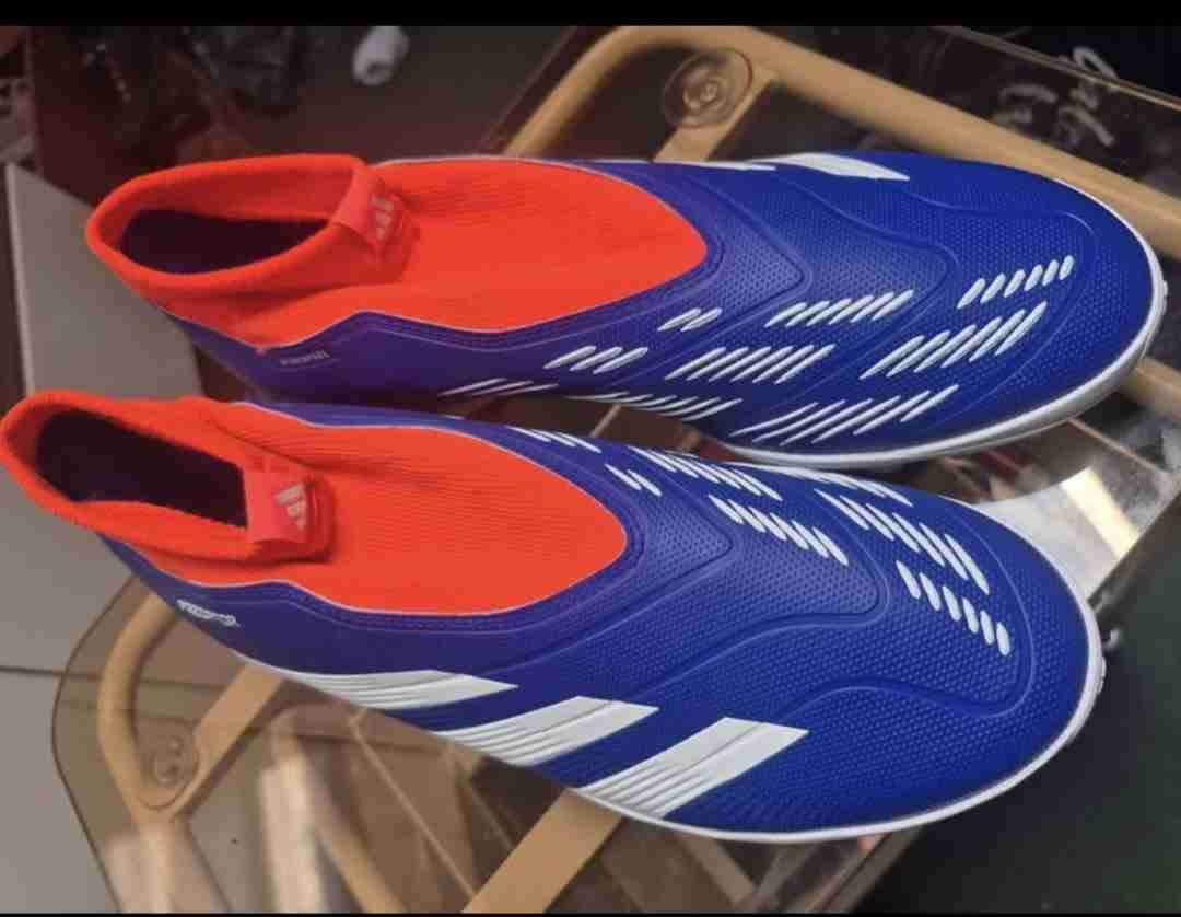 Zapatillas deportivas azul y naranja - 1