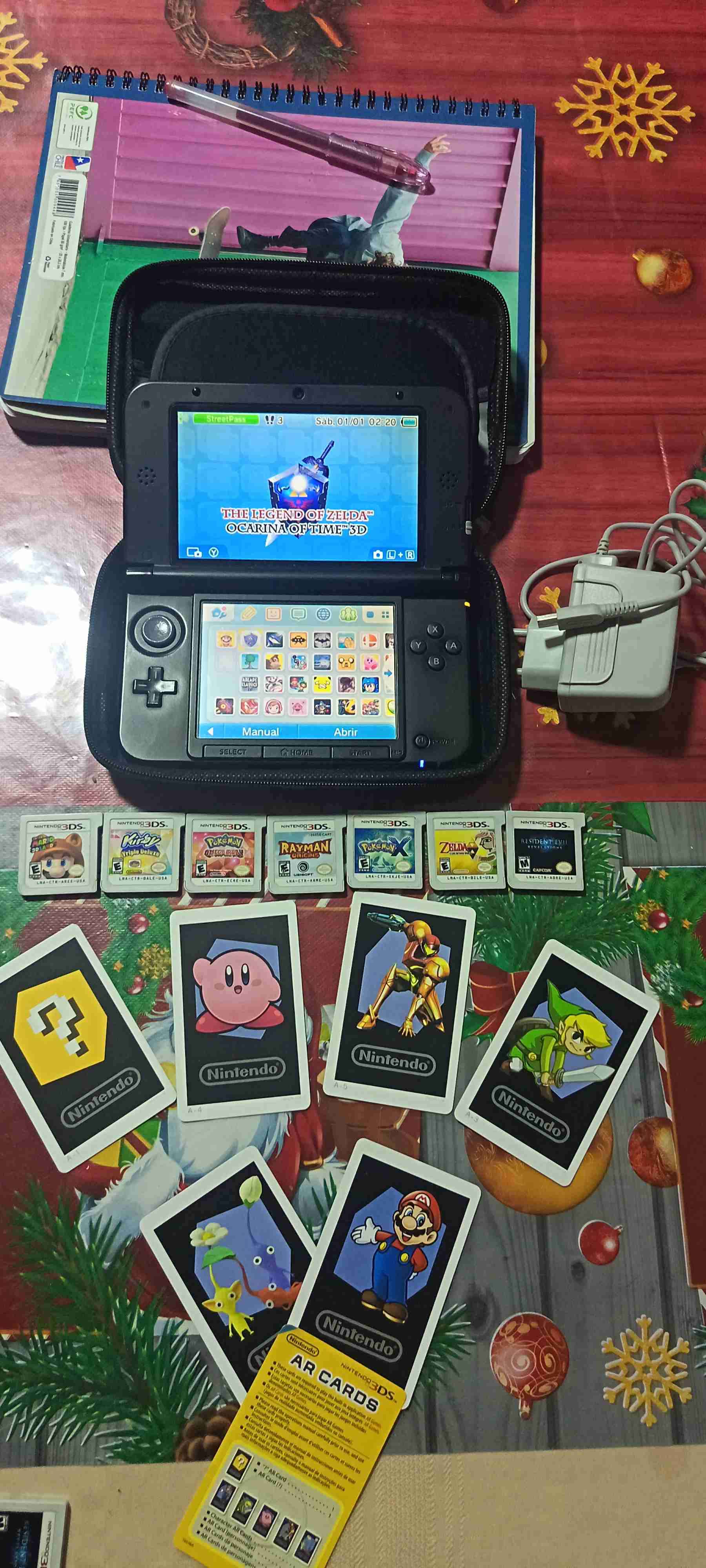 Nintendo 3DS con juegos y cargador - miniatura 1