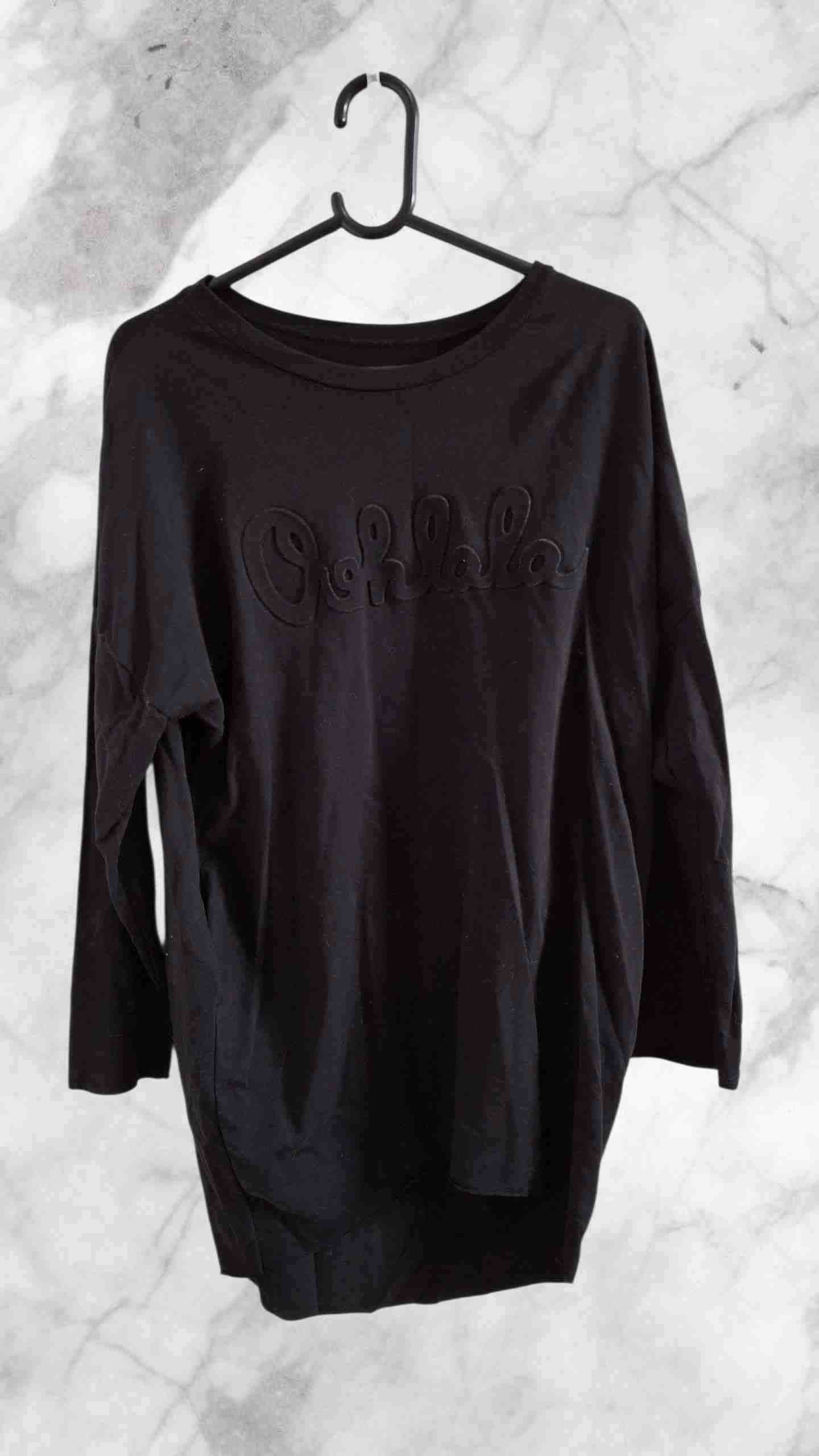 Polerón negro con texto 'Oohlala'