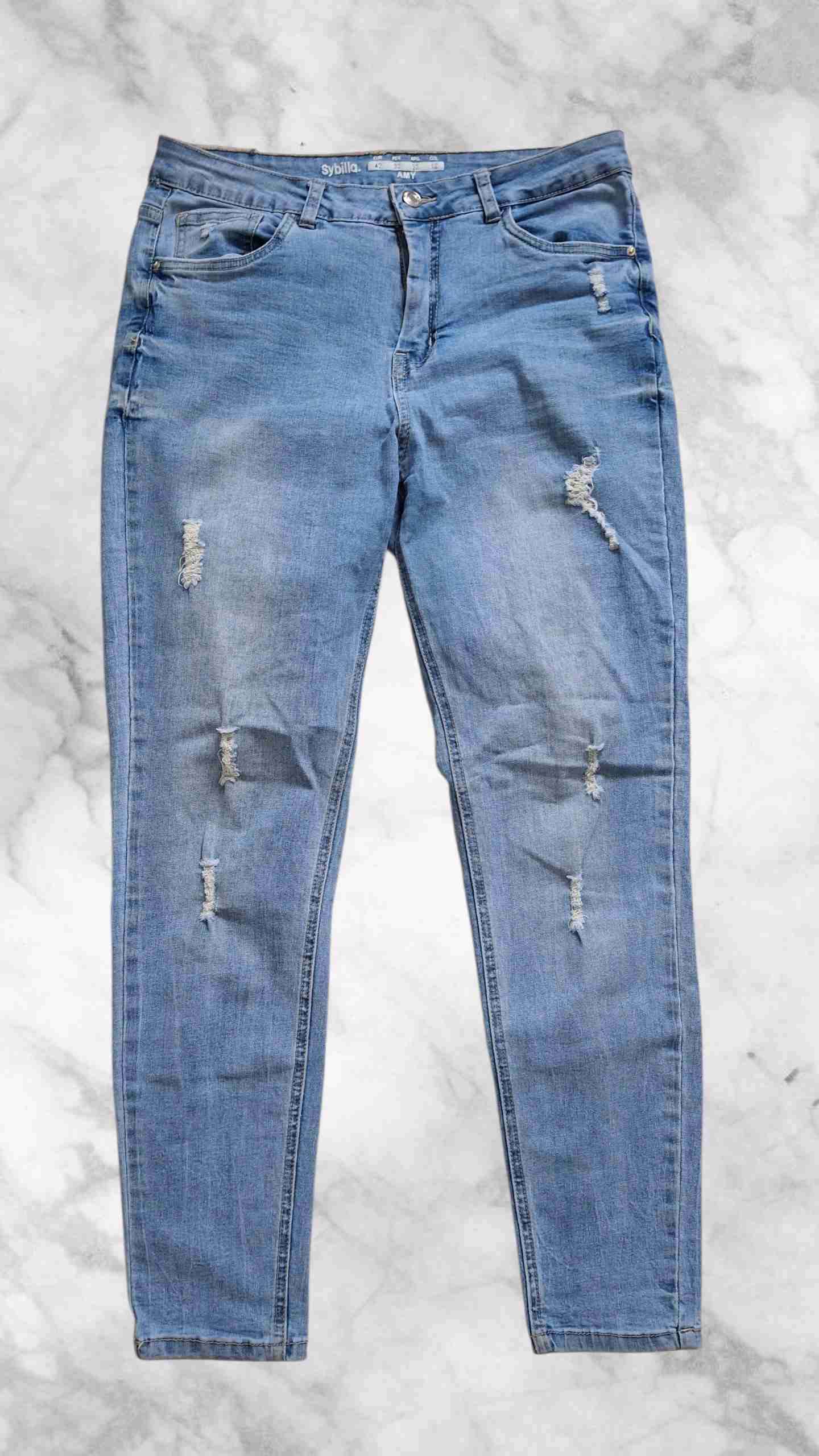 Jeans azules pitillo rasgados - miniatura 1