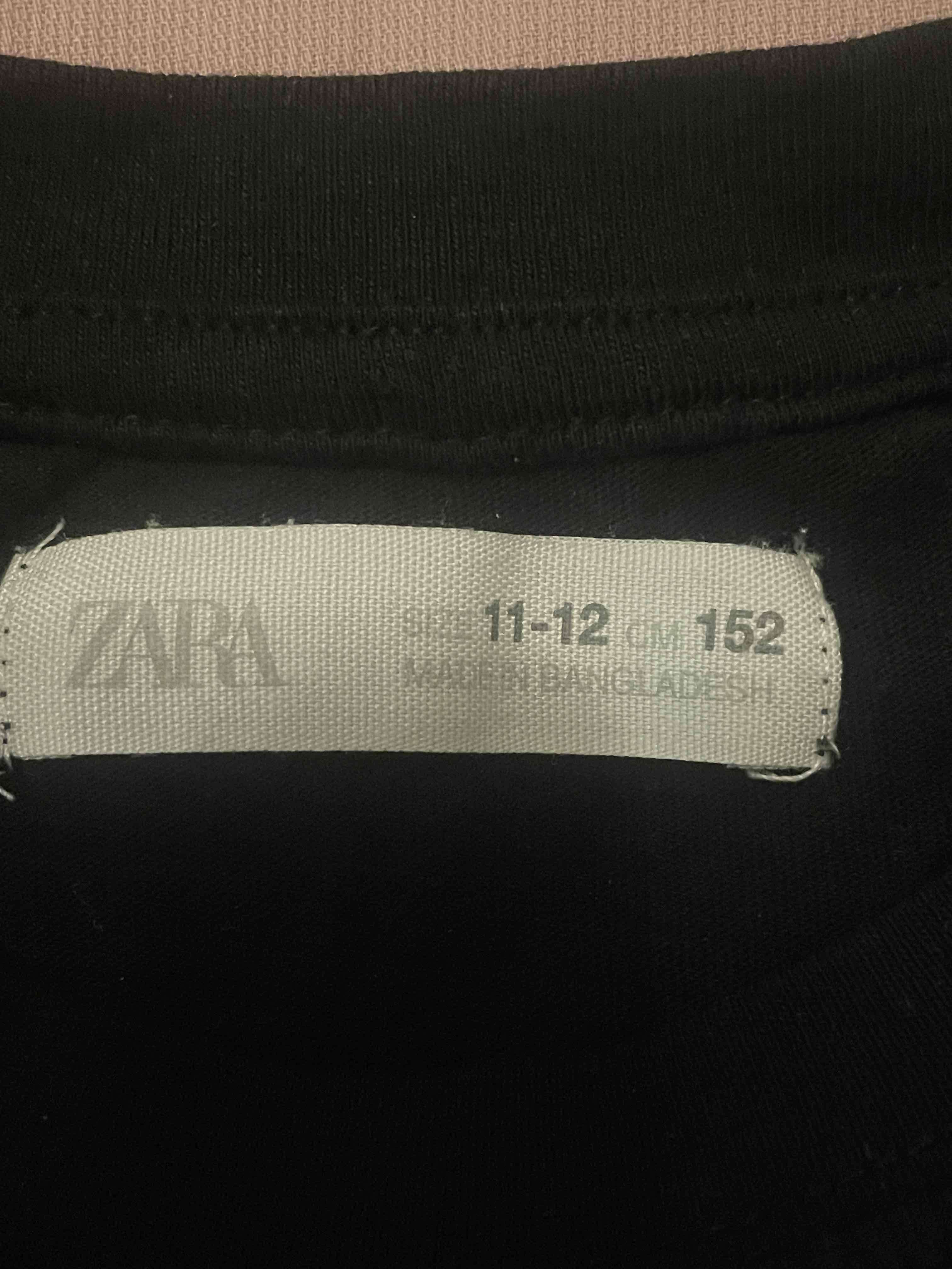 Polera negra con diseño skate -Zara- - miniatura 2