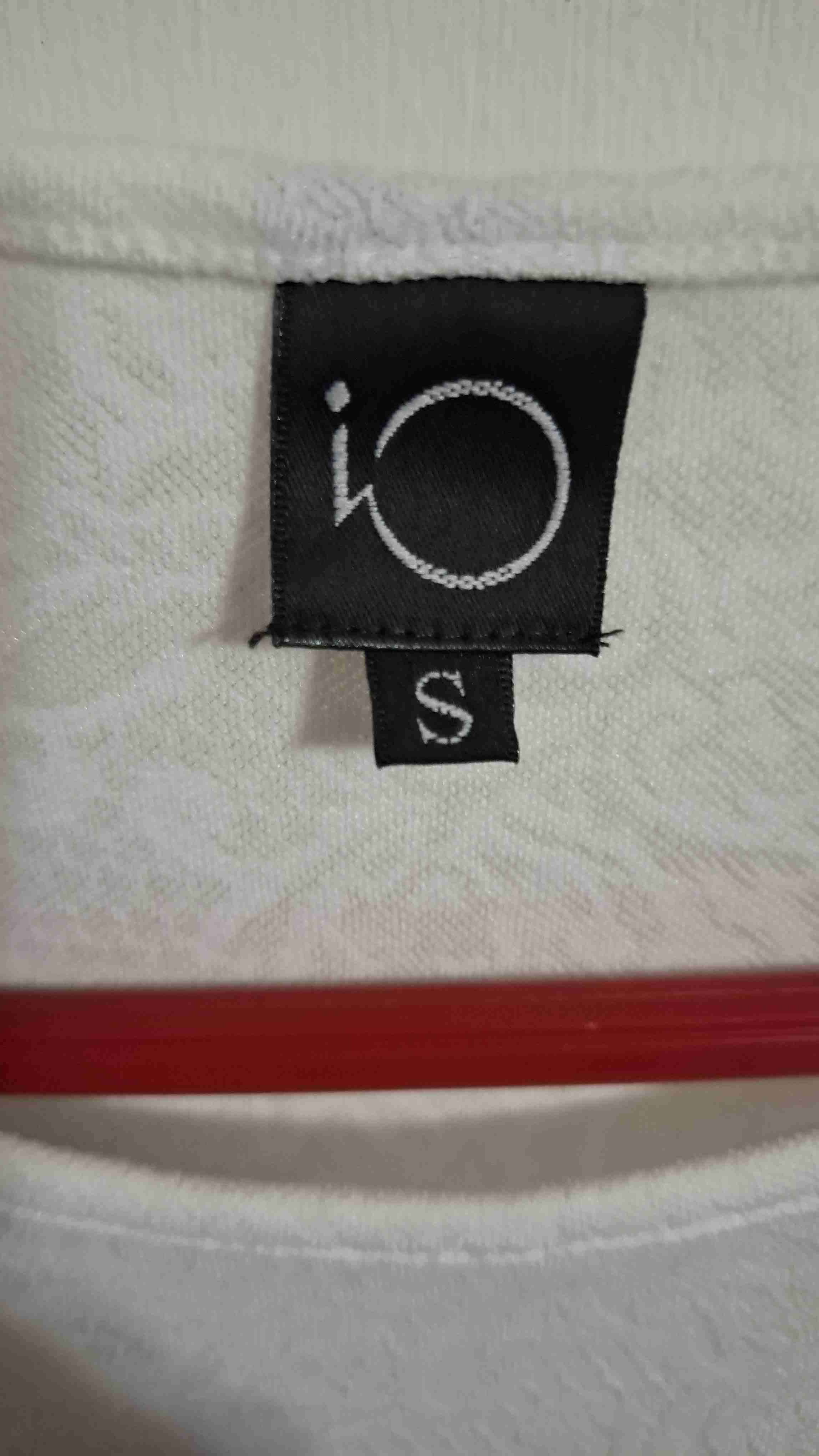 Blusa blanca sin mangas - miniatura 2