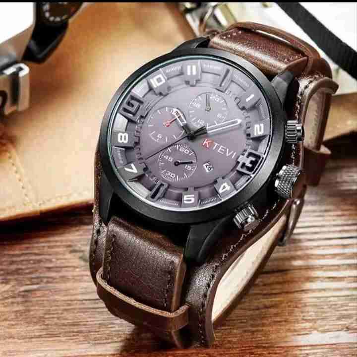 Reloj análogo marrón elegante - miniatura 1