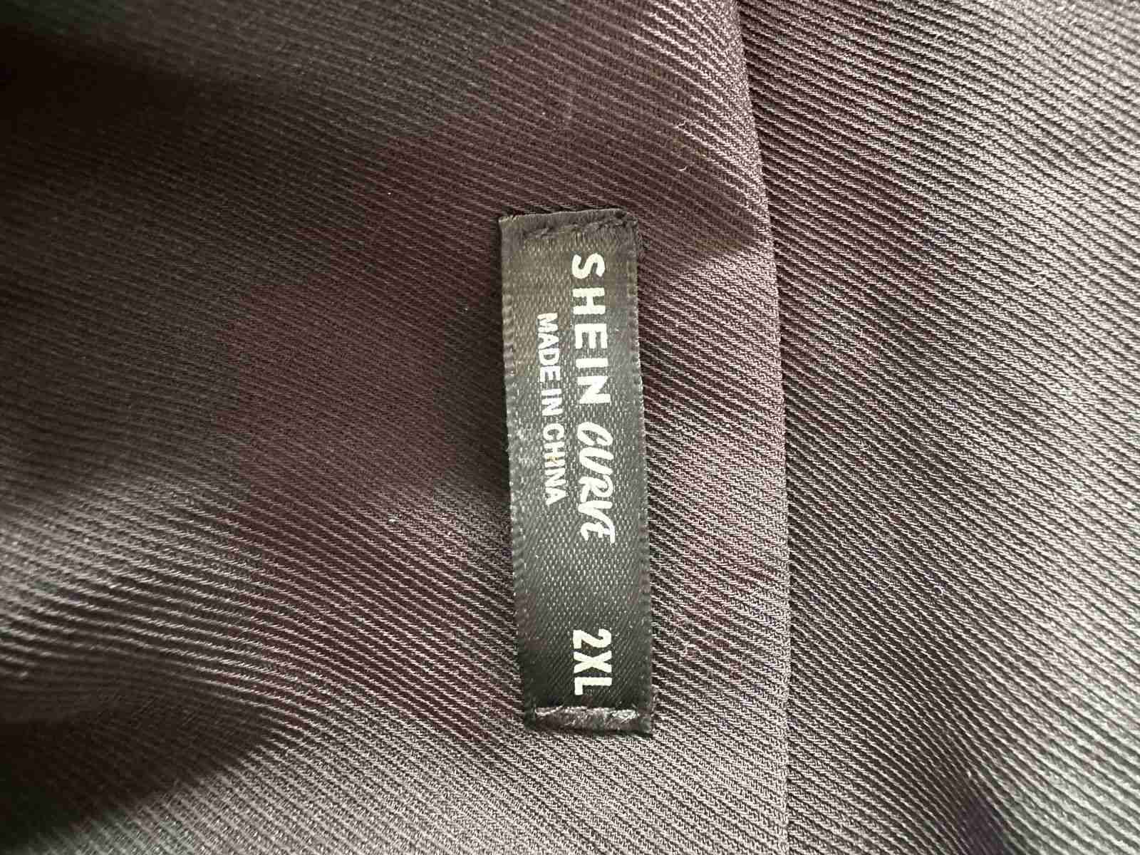 Blazer negro con detalles animal print - miniatura 3