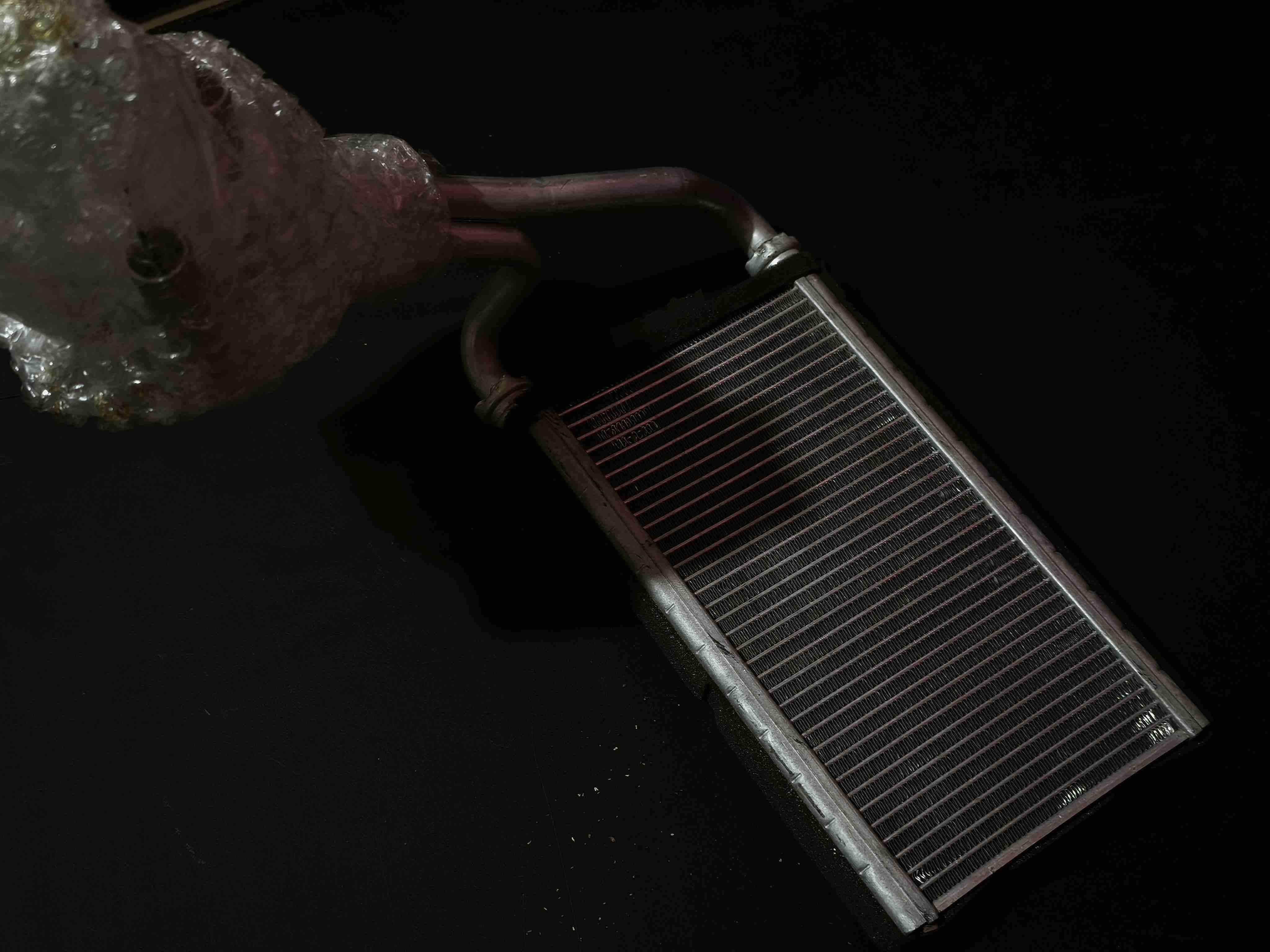 Radiador calefacción Mitsubishi L200. 2016/2024 - 2