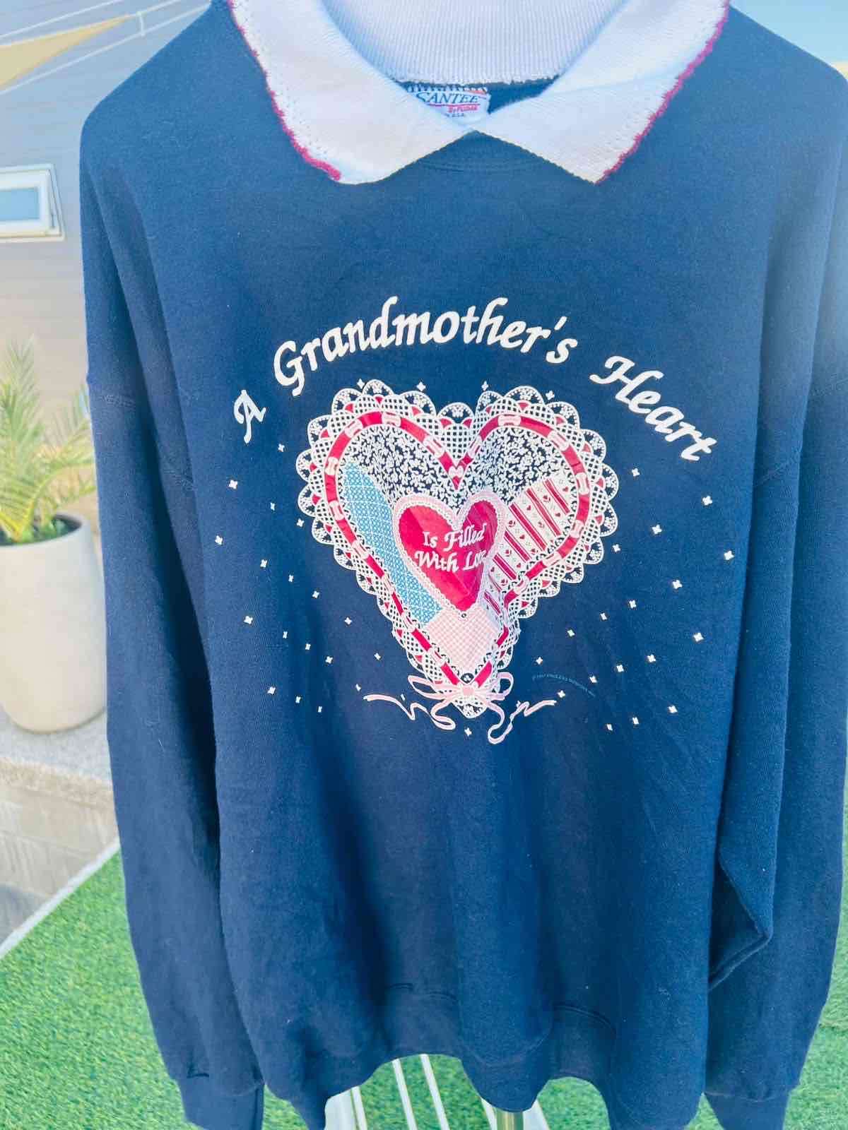 Suéter azul con diseño bordado - miniatura 1