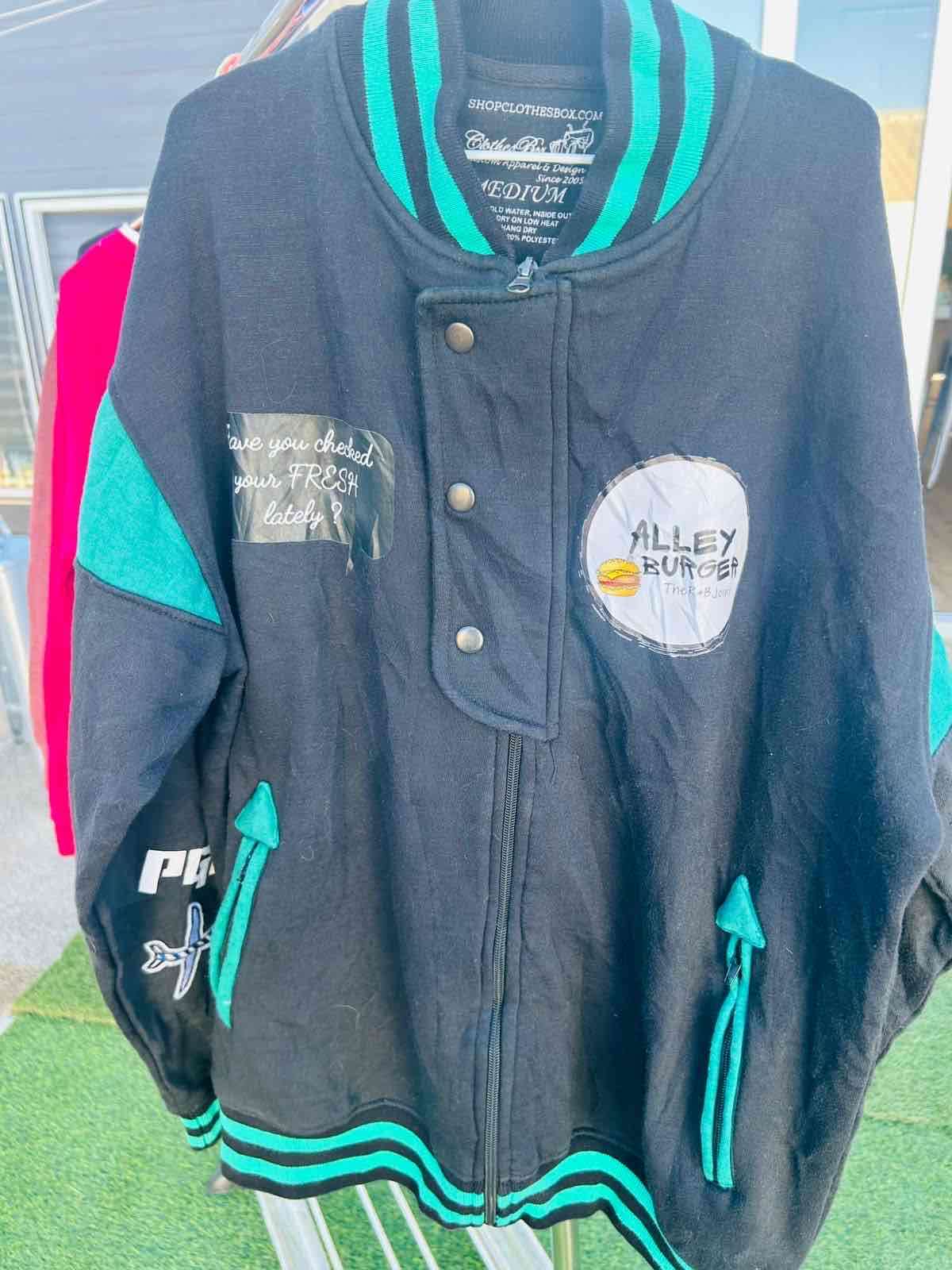 Chaqueta varsity negra y turquesa - miniatura 1