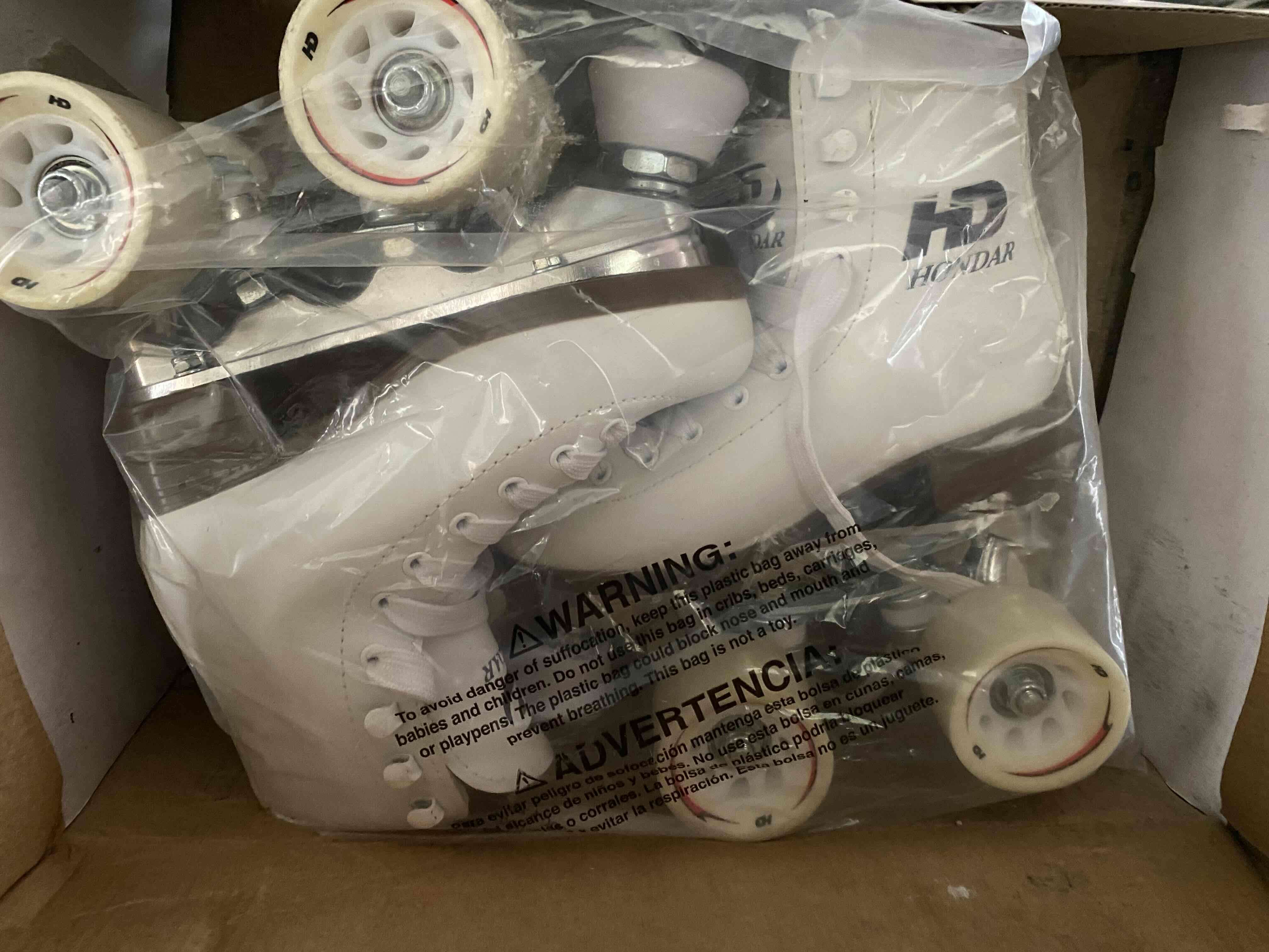 Patines de cuatro ruedas blancos HD - miniatura 1