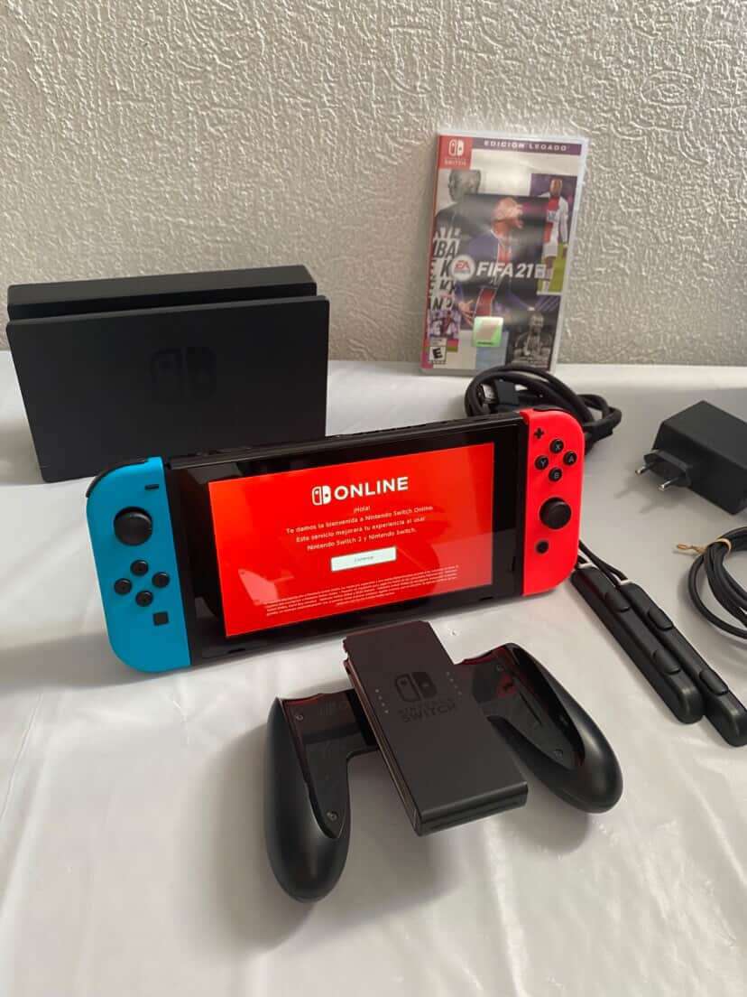 Nintendo Switch 1 + FIFA 21 + Dock + Accesorios - miniatura 1