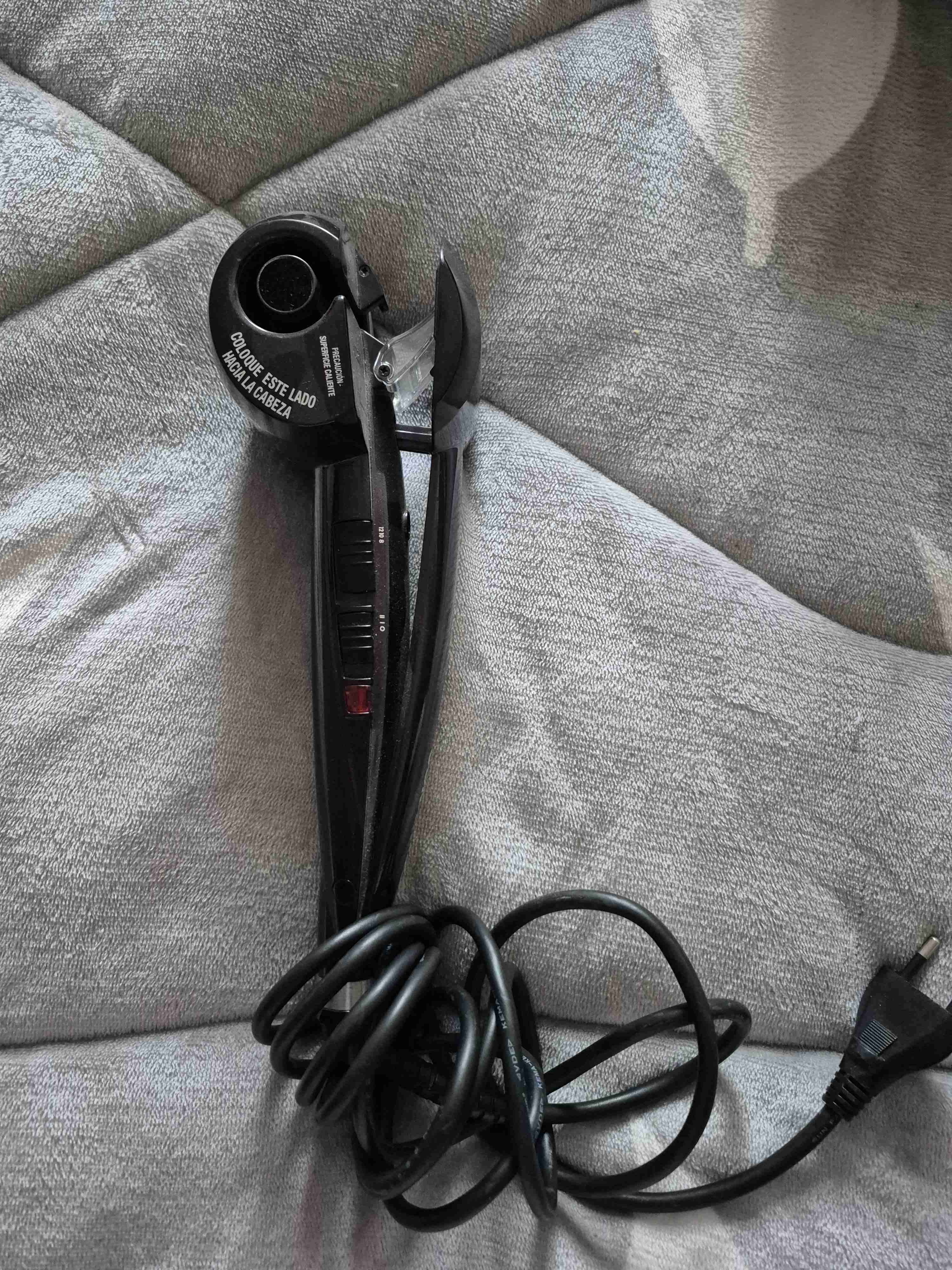 Rizador de cabello negro - miniatura 1