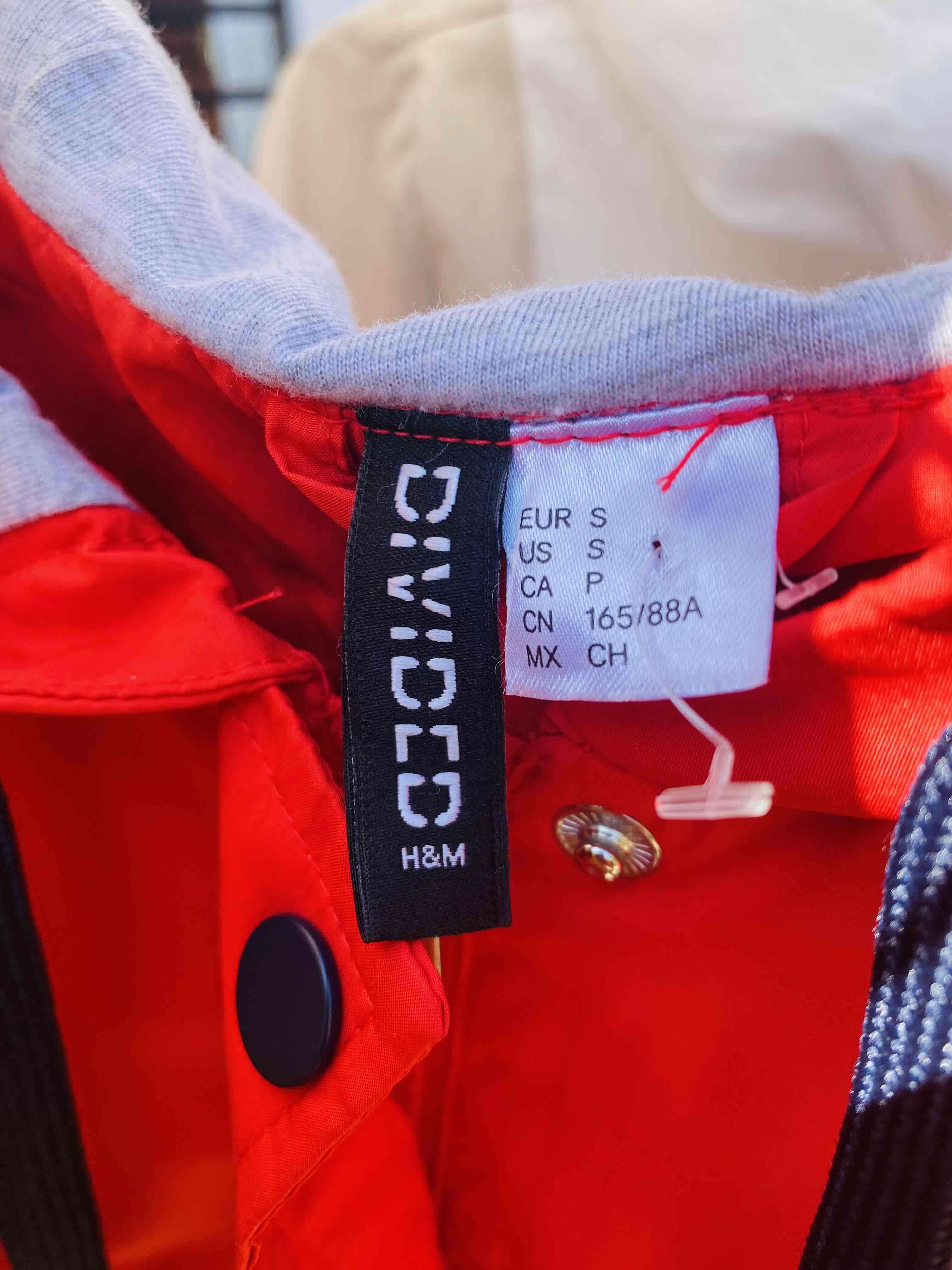 Chaqueta cortaviento roja y azul - miniatura 2