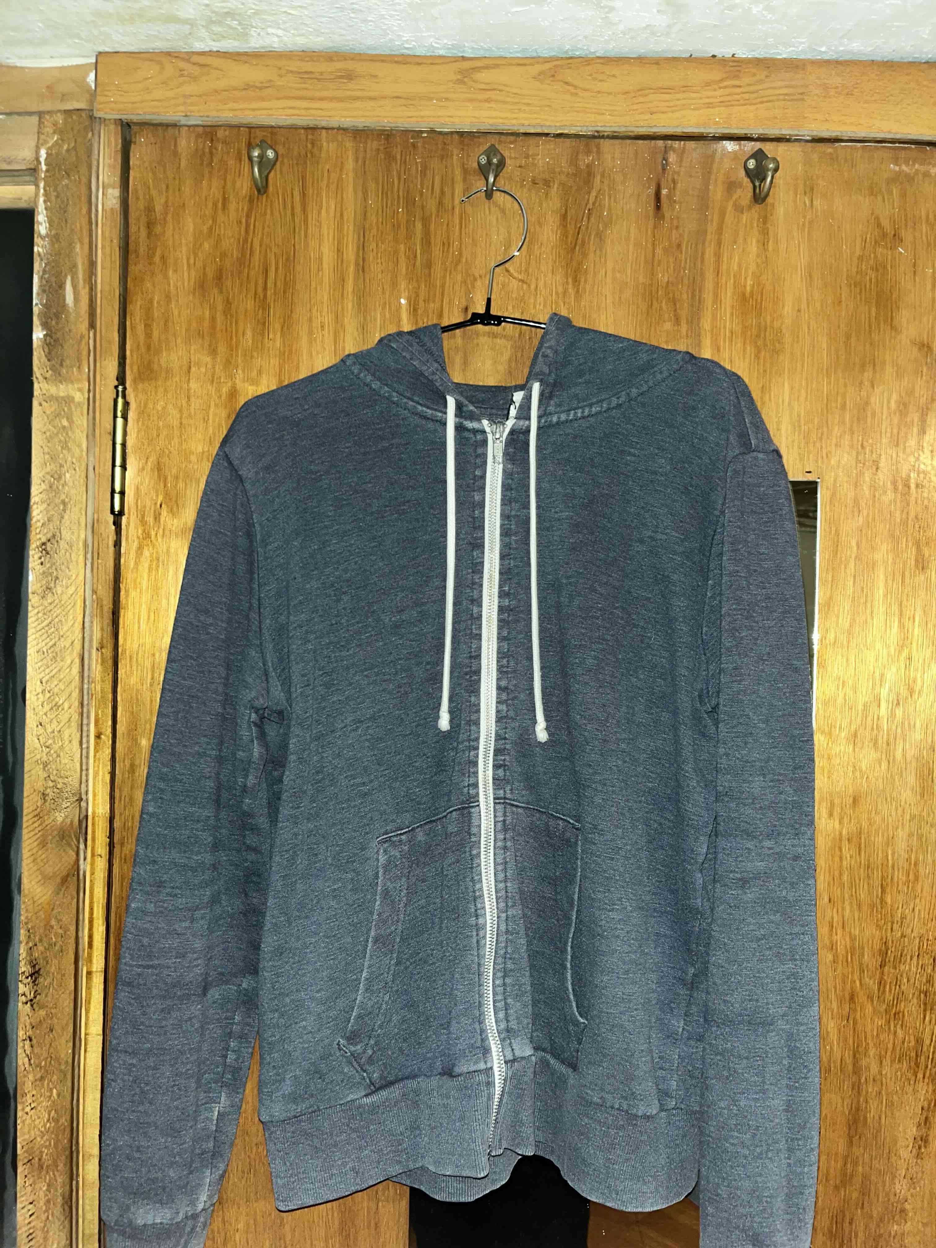 Polerón azul con capucha y cierre HYM - miniatura 1