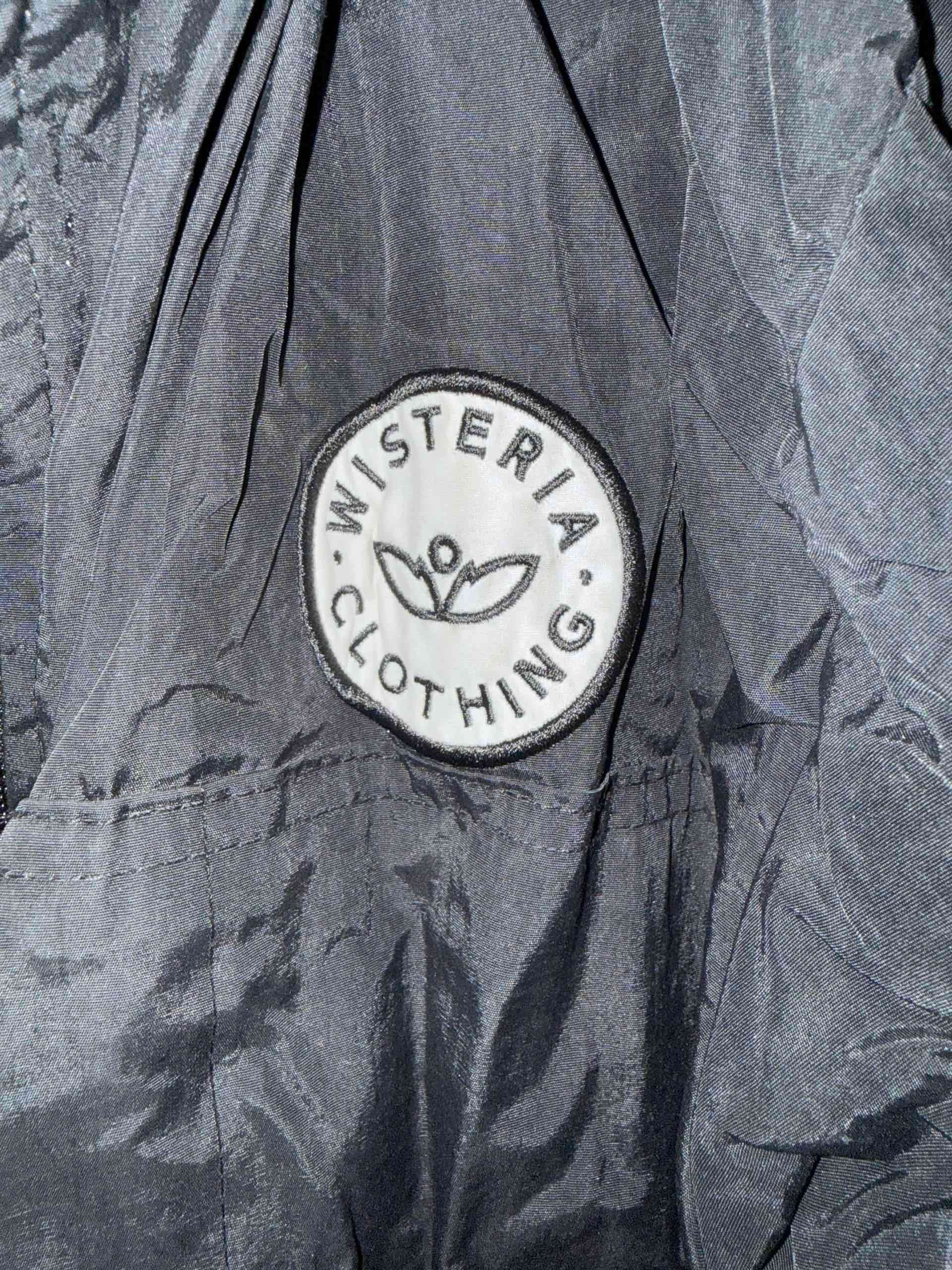 Chaqueta negra resistente al agua - miniatura 2