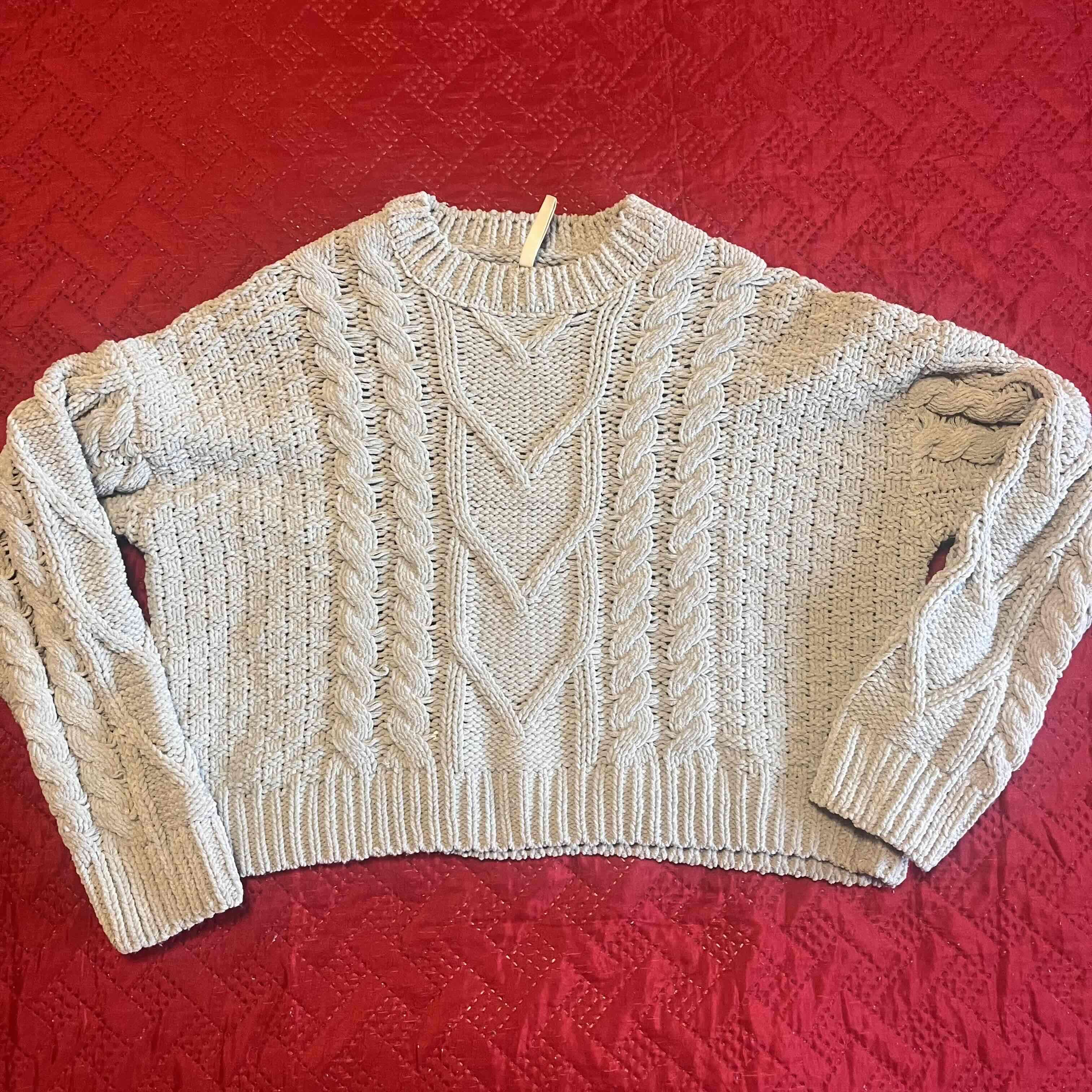 Suéter de lana trenzado