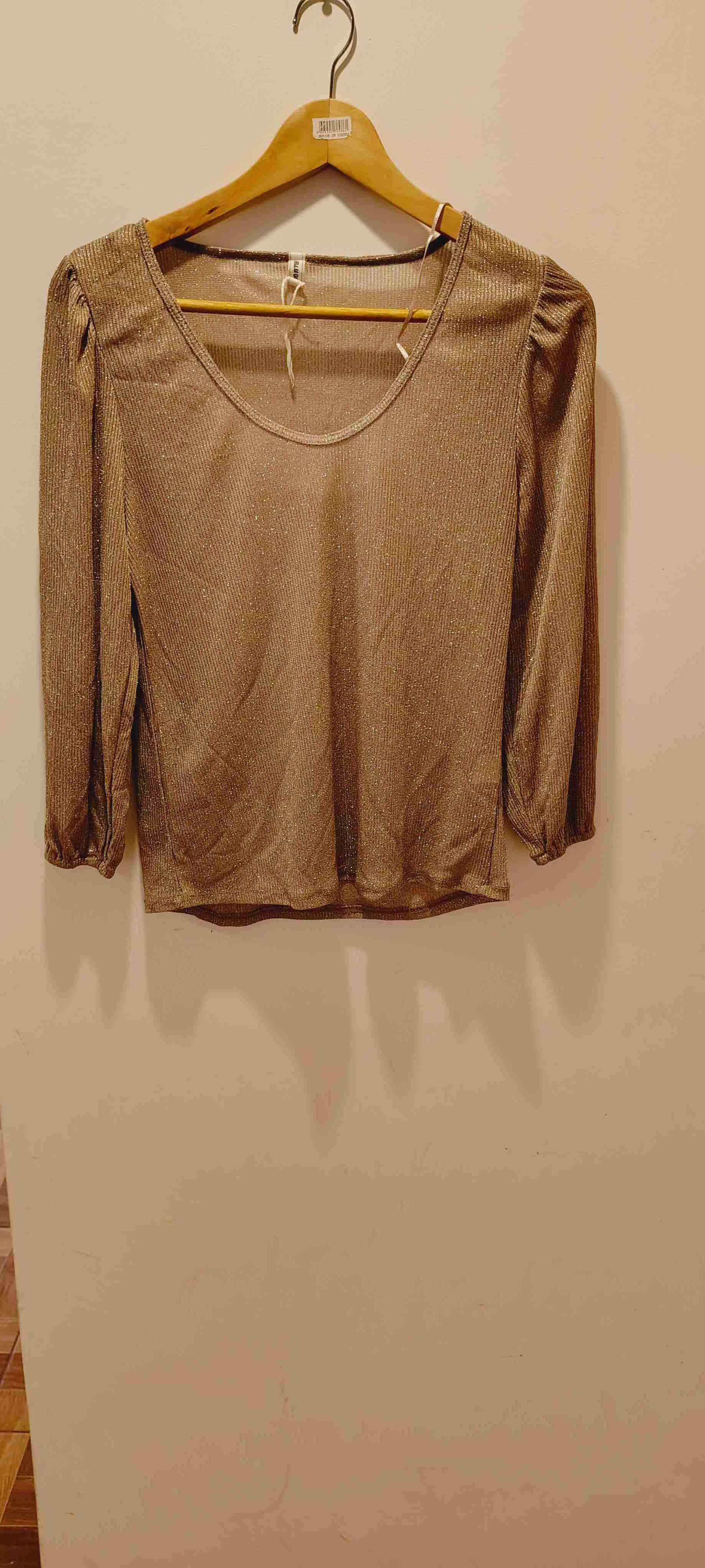 Blusa dorada con brillo - miniatura 1