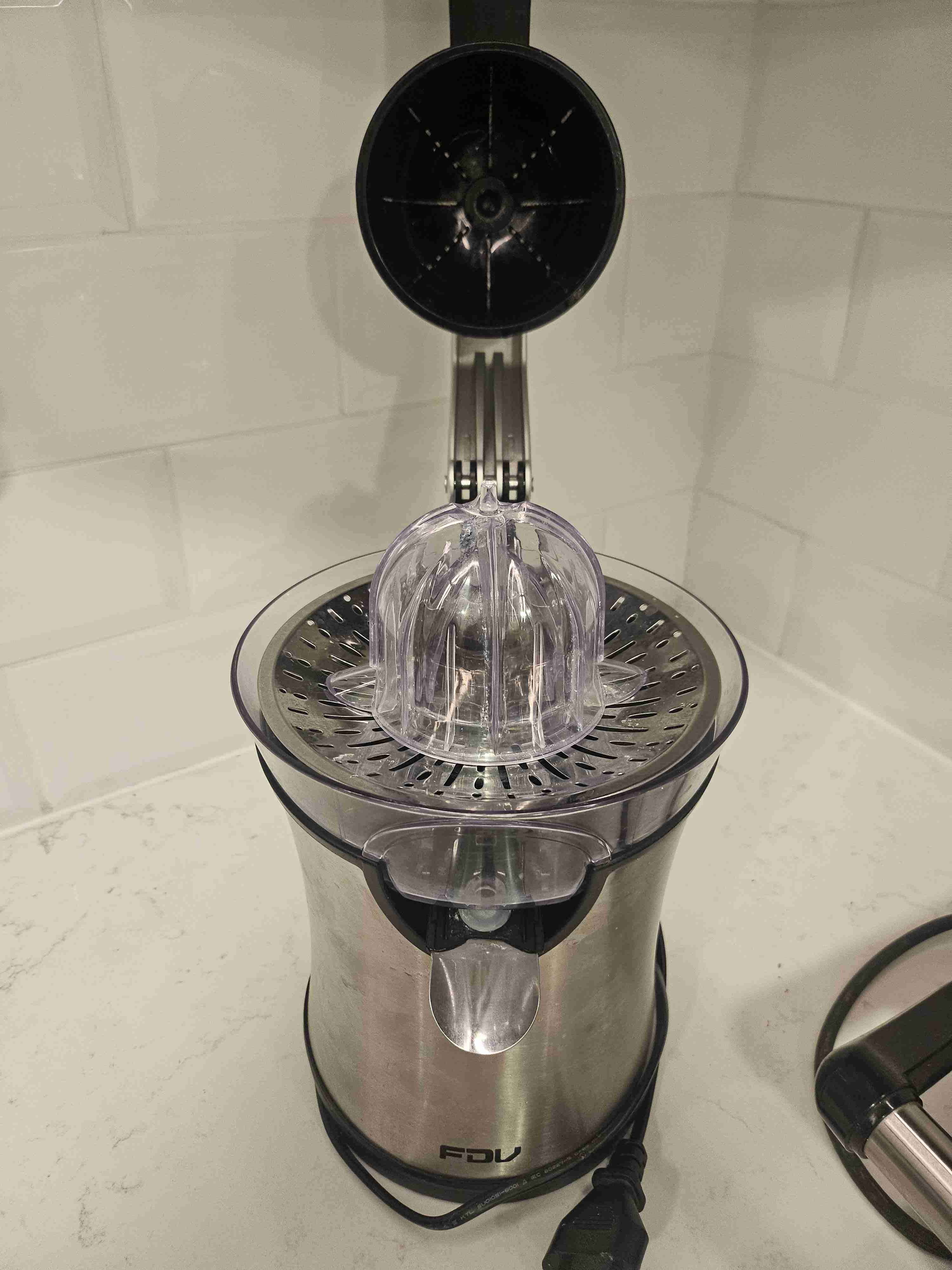 Exprimidor eléctrico de acero inoxidable - miniatura 3