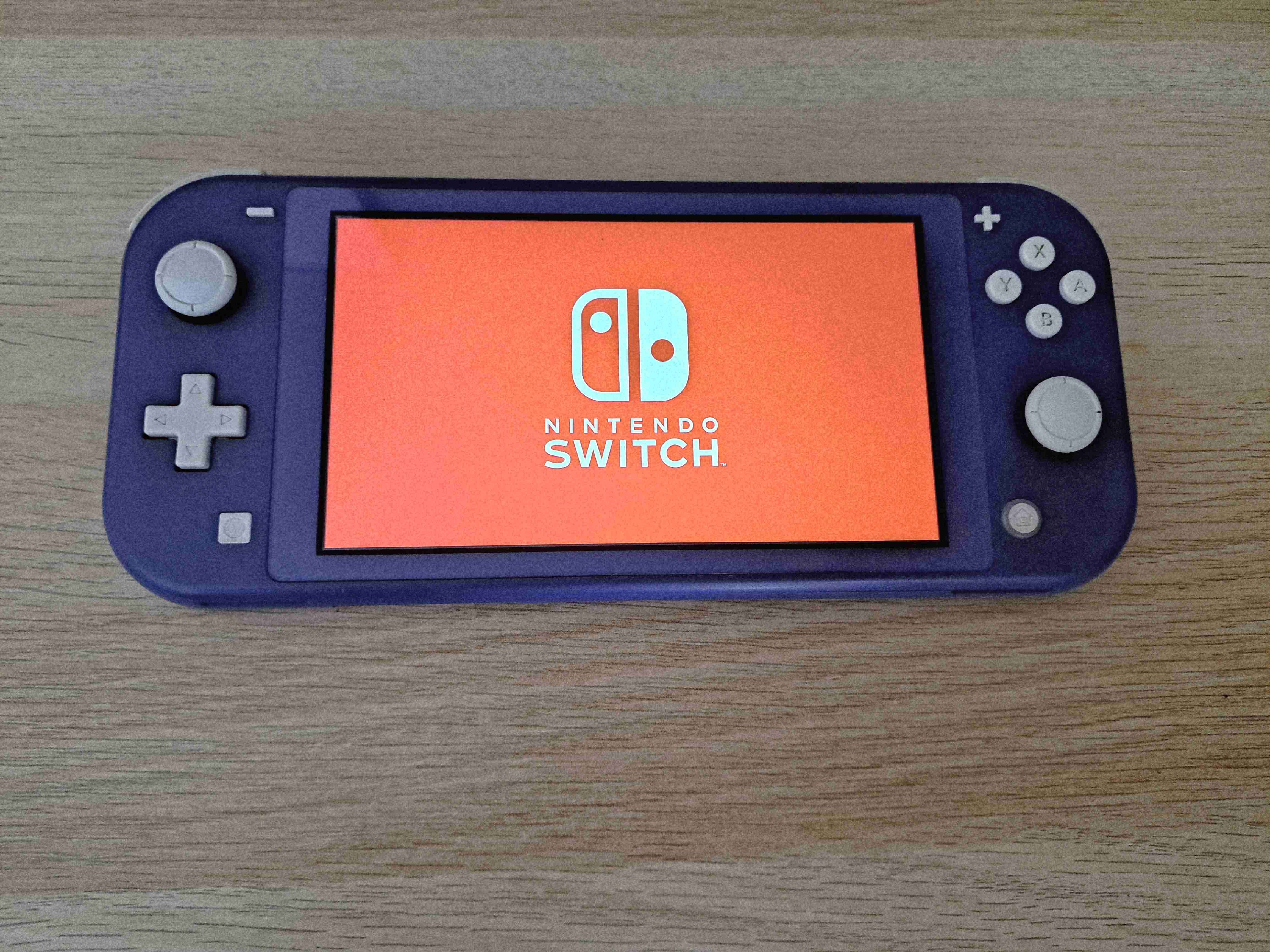 Consola Nintendo Switch Lite con 2 juegos - miniatura 1