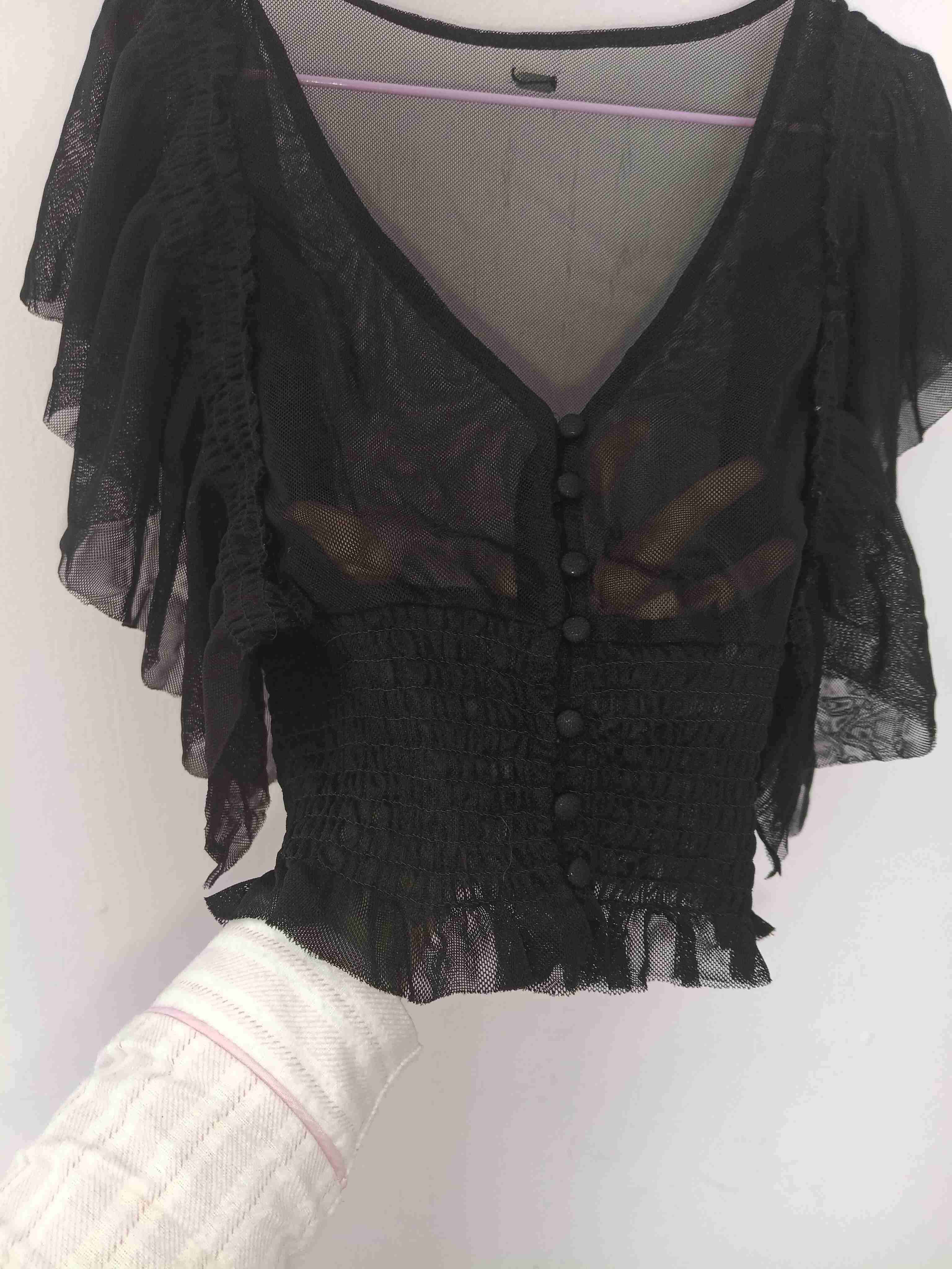 Blusa negra con abertura - miniatura 2